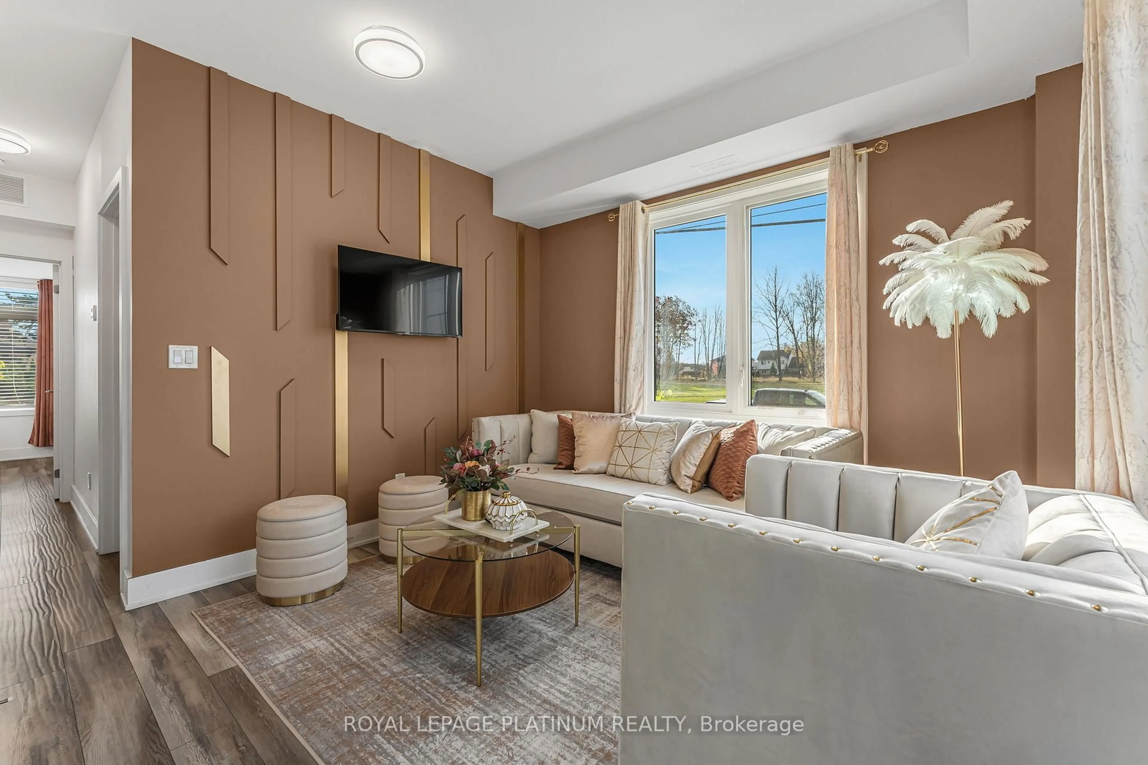 Living room with furniture, unknown for 6065 MCLEOD Rd #213, Niagara Falls Ontario L2G 0Z7