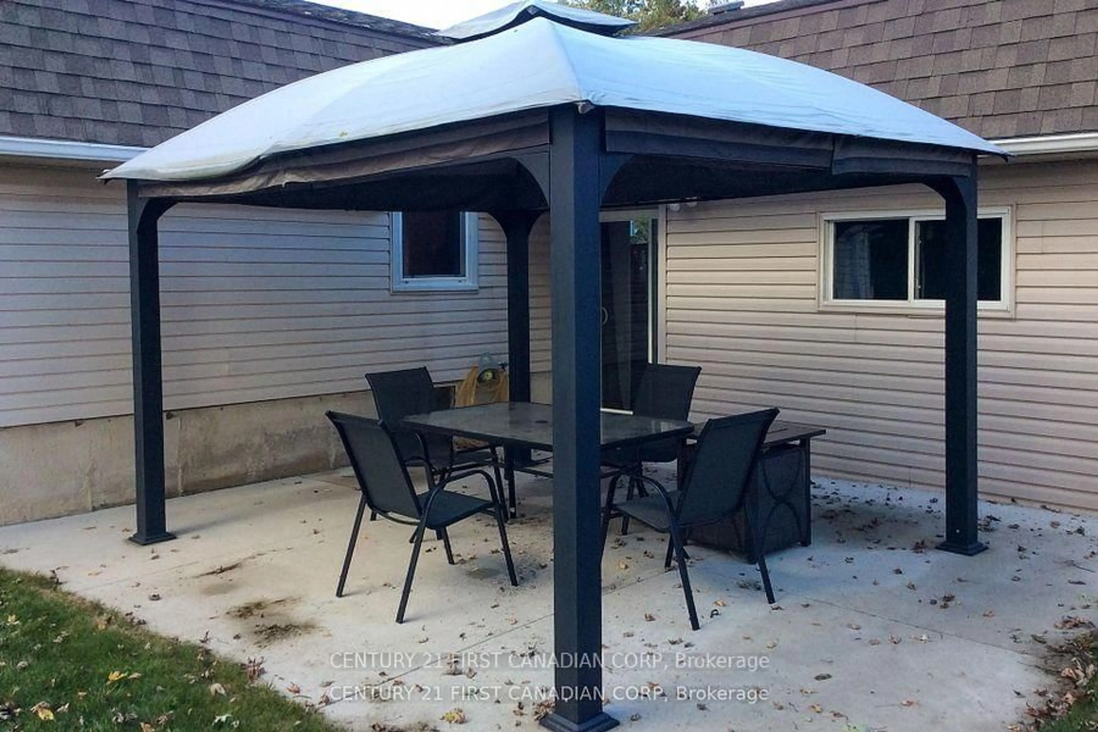 Patio, street for 106 Angelo Dr, West Elgin Ontario N0L 2P0