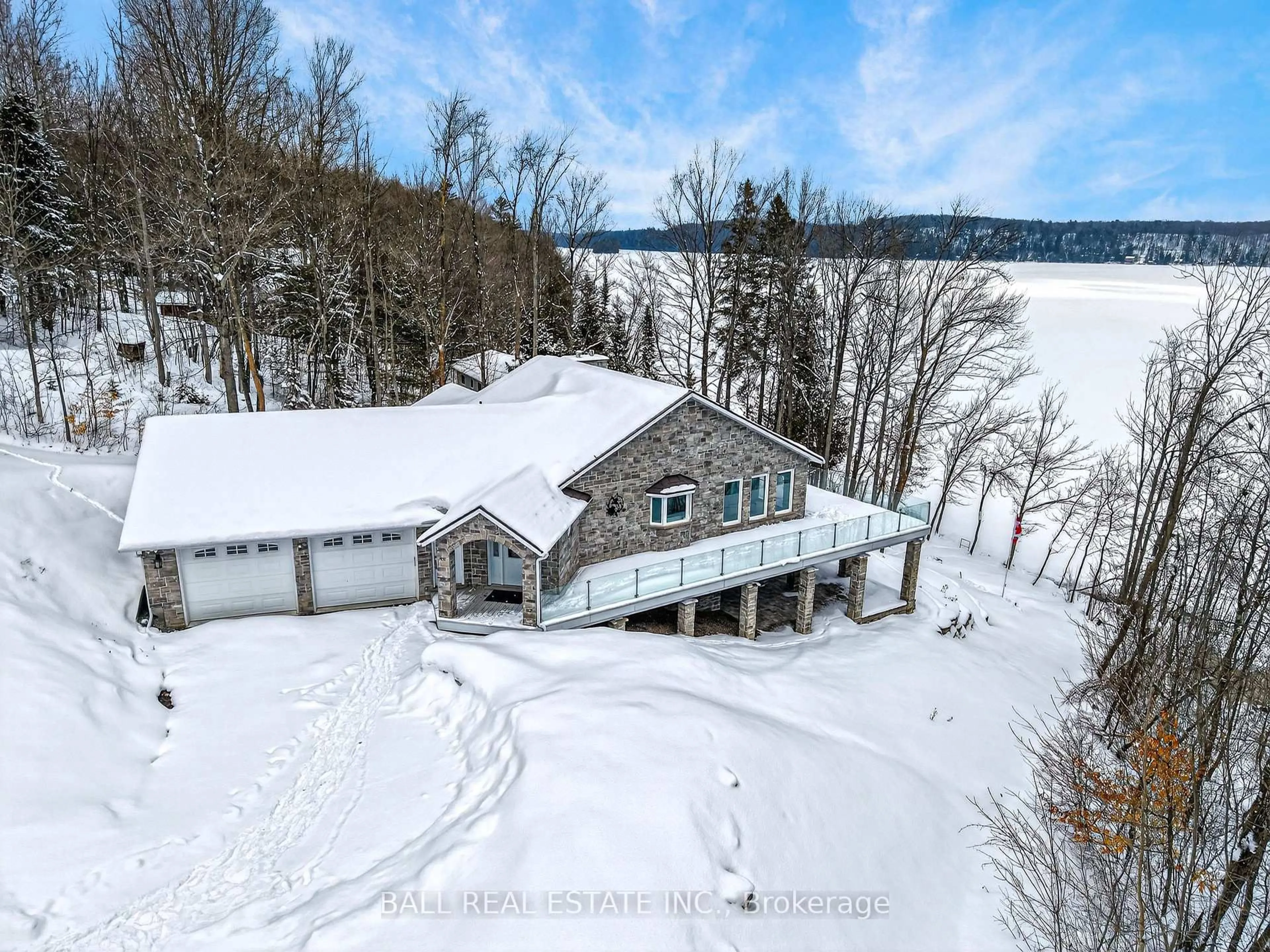 A pic from outside/outdoor area/front of a property/back of a property/a pic from drone, water/lake/river/ocean view for 13540 Highway 35, Minden Hills Ontario K0M 2K0