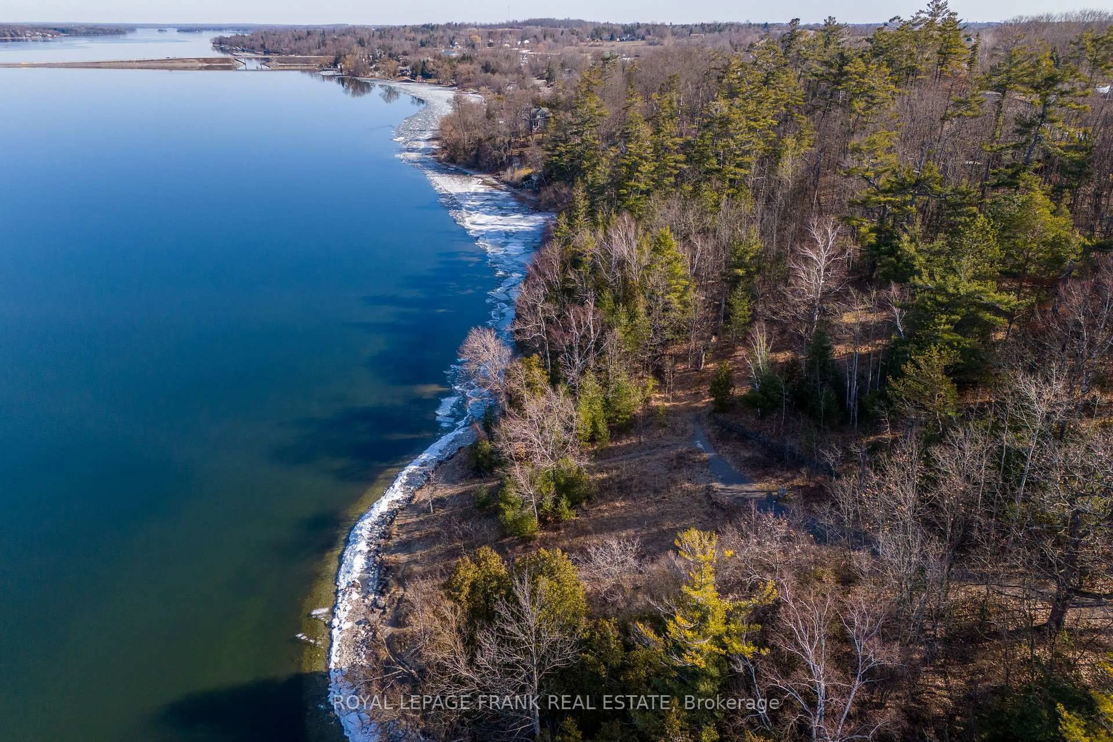 A pic from outside/outdoor area/front of a property/back of a property/a pic from drone, water/lake/river/ocean view for 721 Hatton Ave, Selwyn Ontario K0L 1H0
