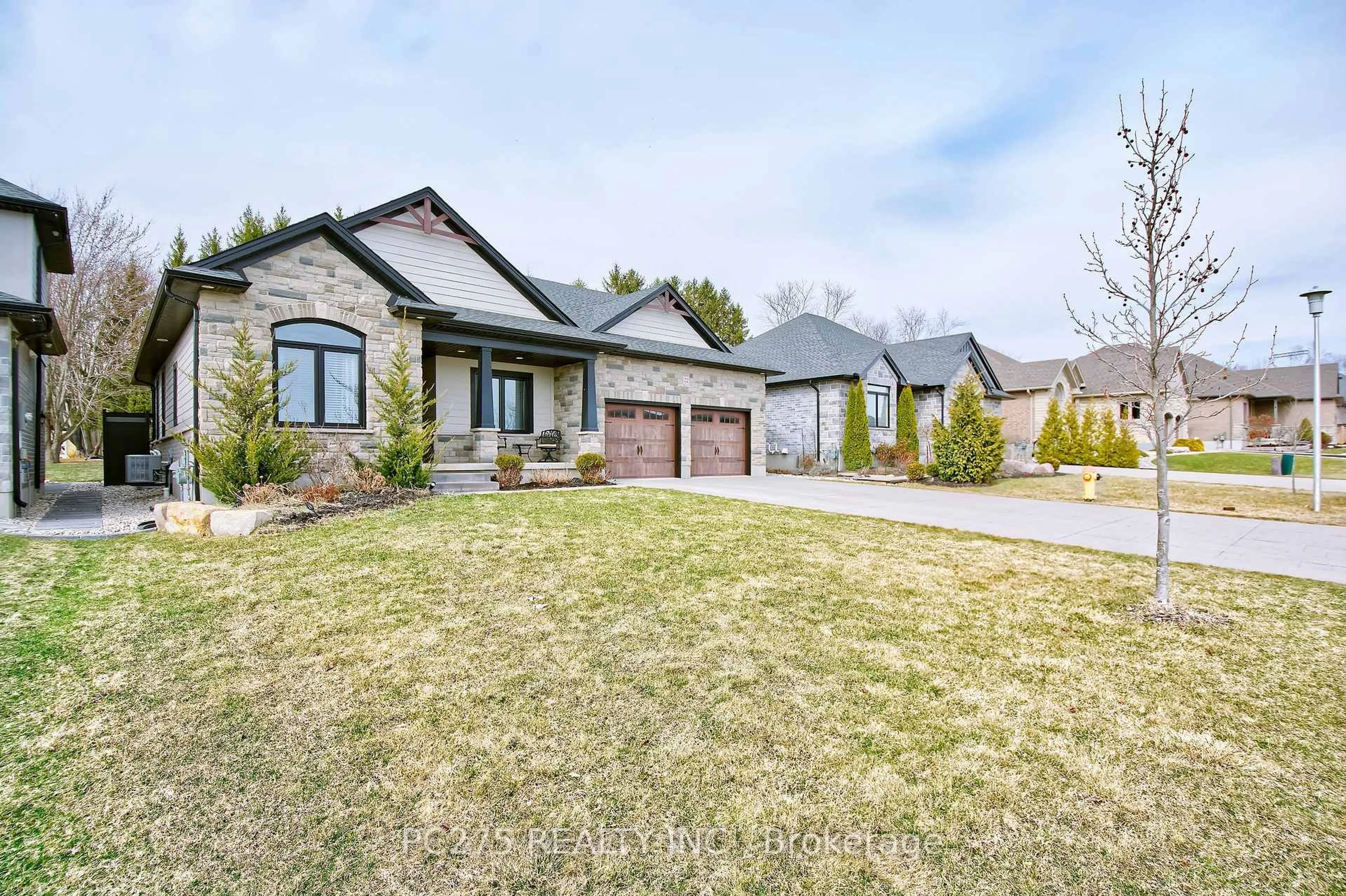 Home with brick exterior material, street for 22 Talbot Grove Lane, Southwold Ontario N5P 3T2