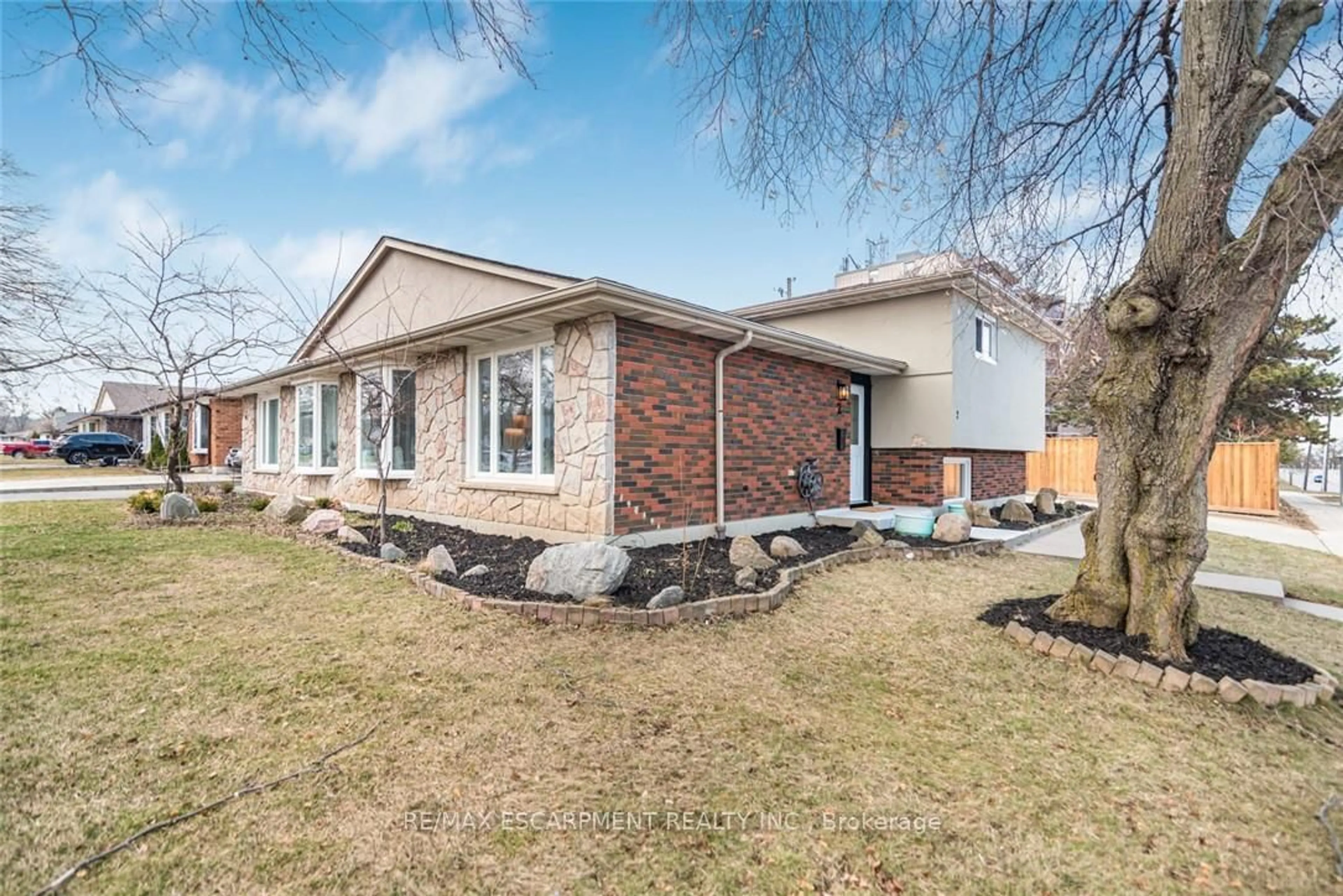 Home with brick exterior material, street for 2 Country Club Dr, Hamilton Ontario L8K 5W2