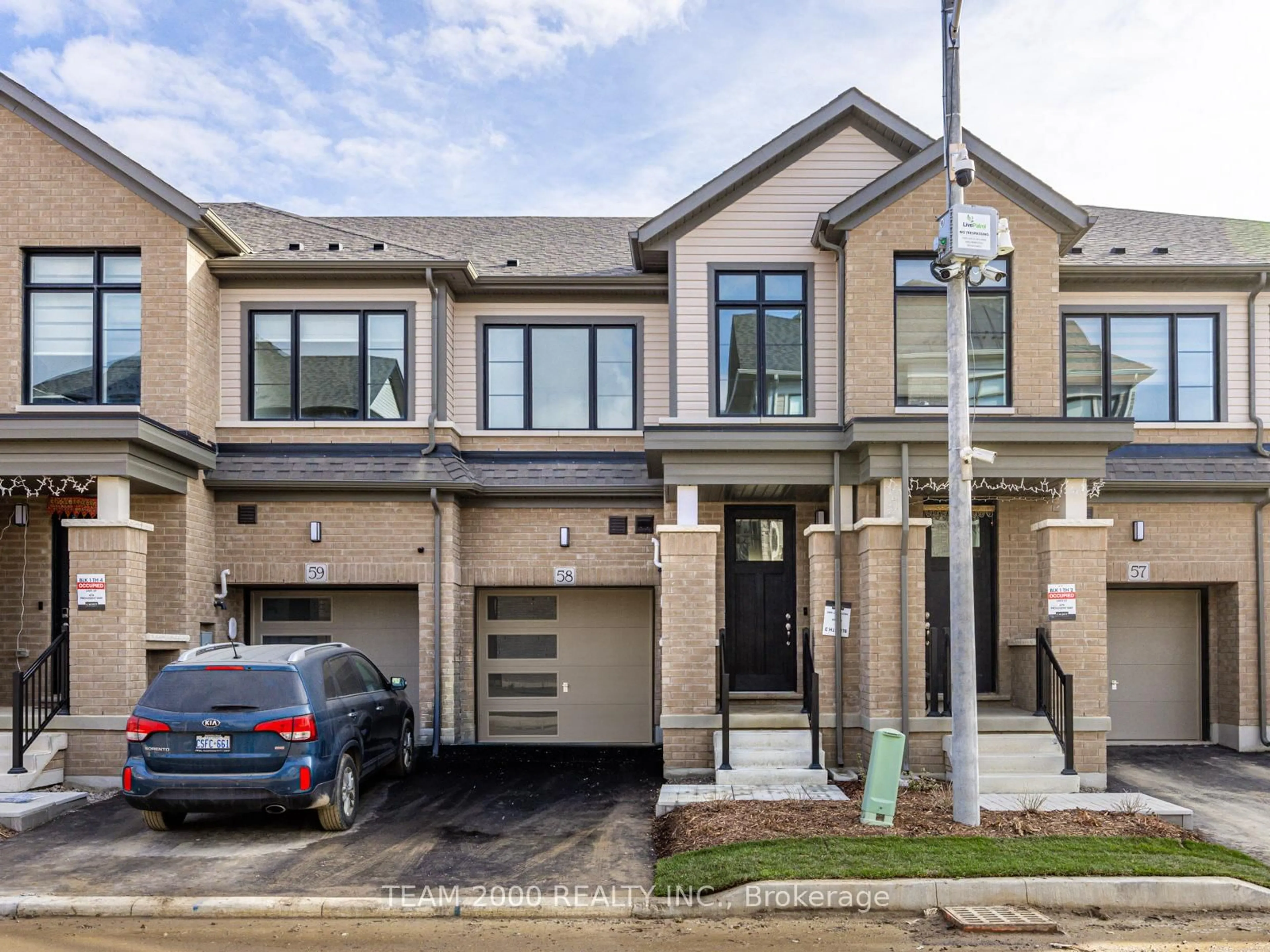 Home with brick exterior material, street for 474 Provident Way #58, Hamilton Ontario L0R 1W0