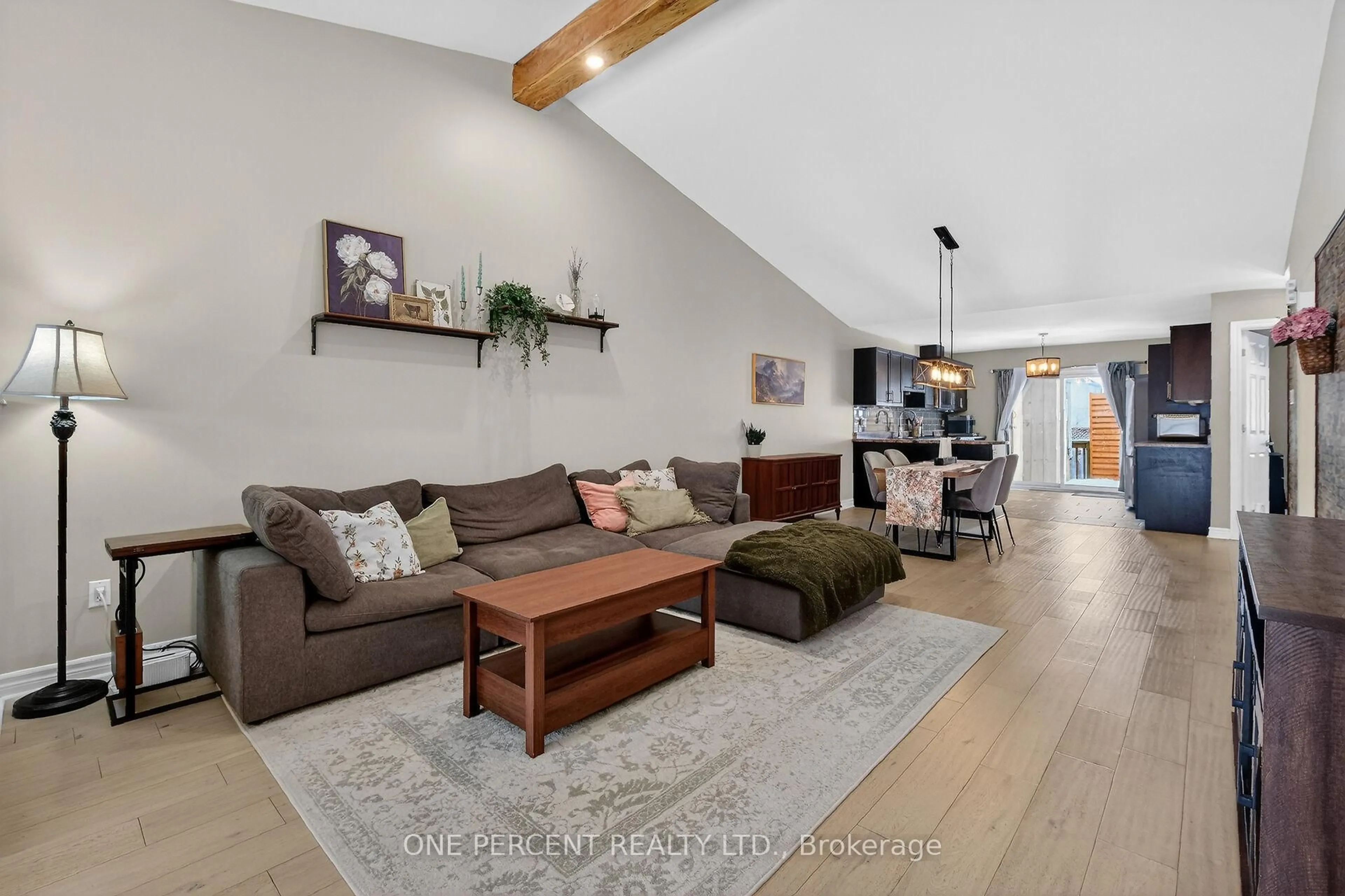 Living room with furniture, wood/laminate floor for 210 Trillium Circ, Alfred and Plantagenet Ontario K0A 3K0