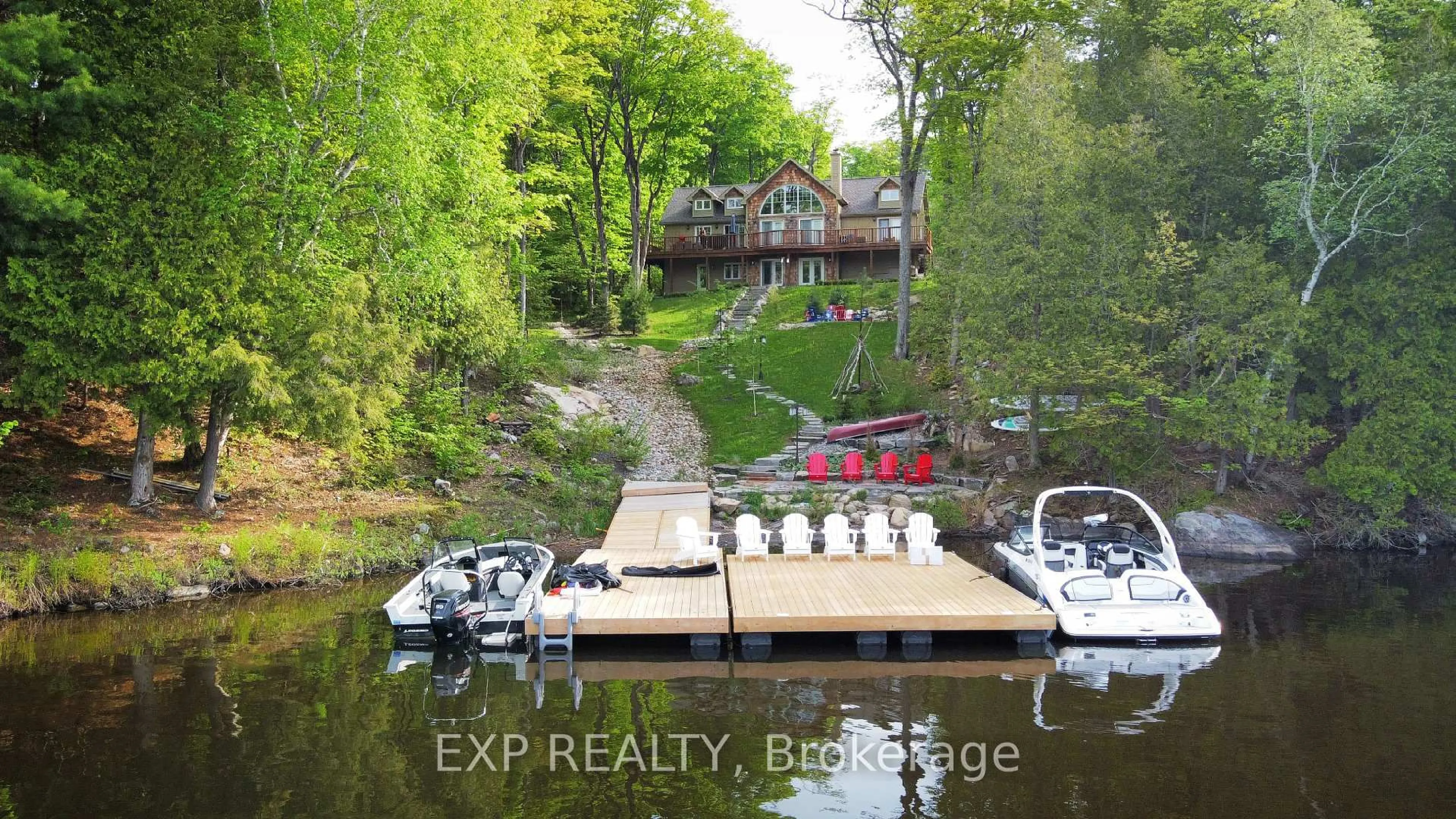 A pic from outside/outdoor area/front of a property/back of a property/a pic from drone, water/lake/river/ocean view for 1235 Shea Rd, Muskoka Lakes Ontario P0B 1M0