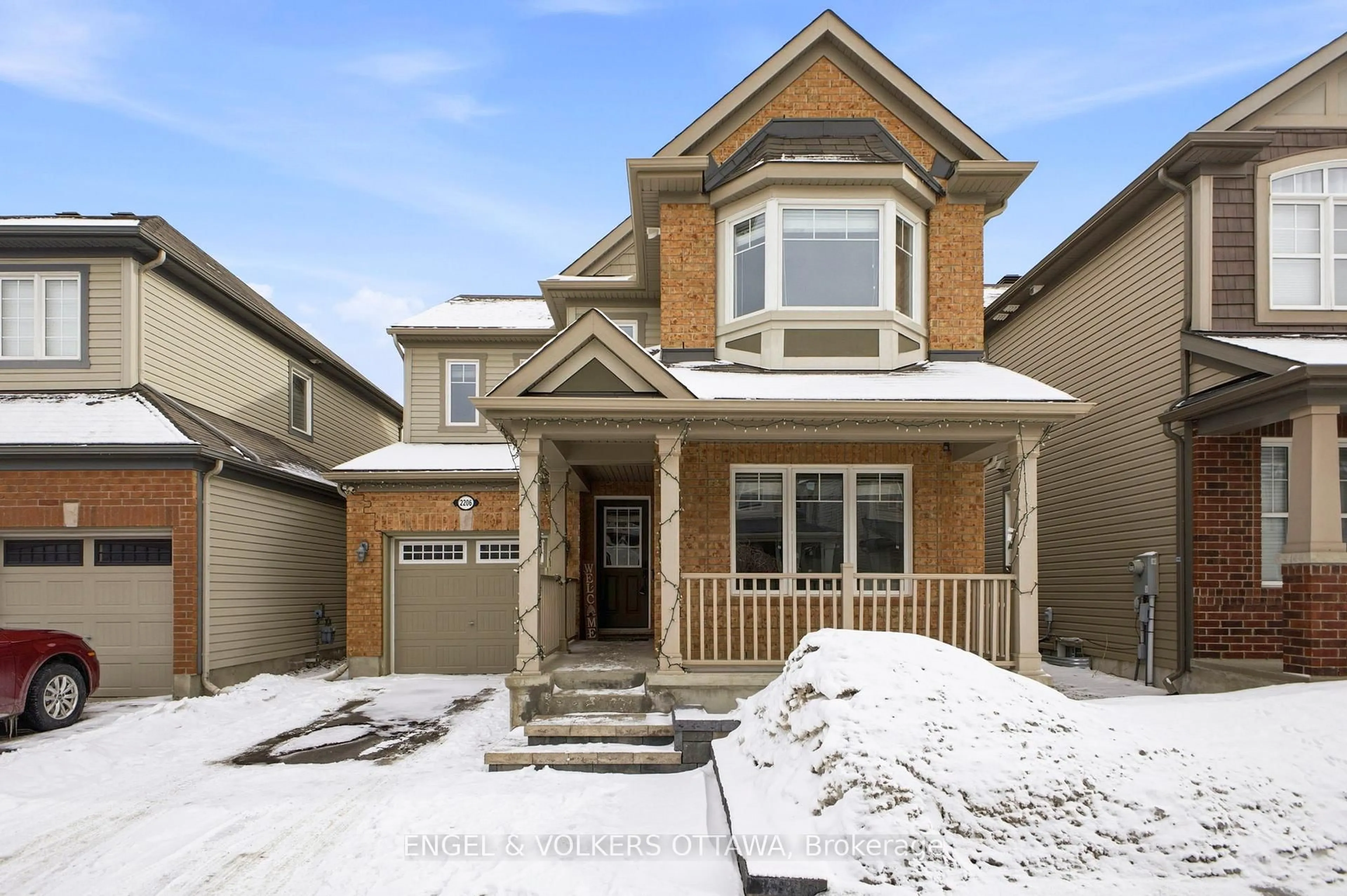 Home with brick exterior material, street for 2206 Watercolours Way, Ottawa Ontario K2J 5J8