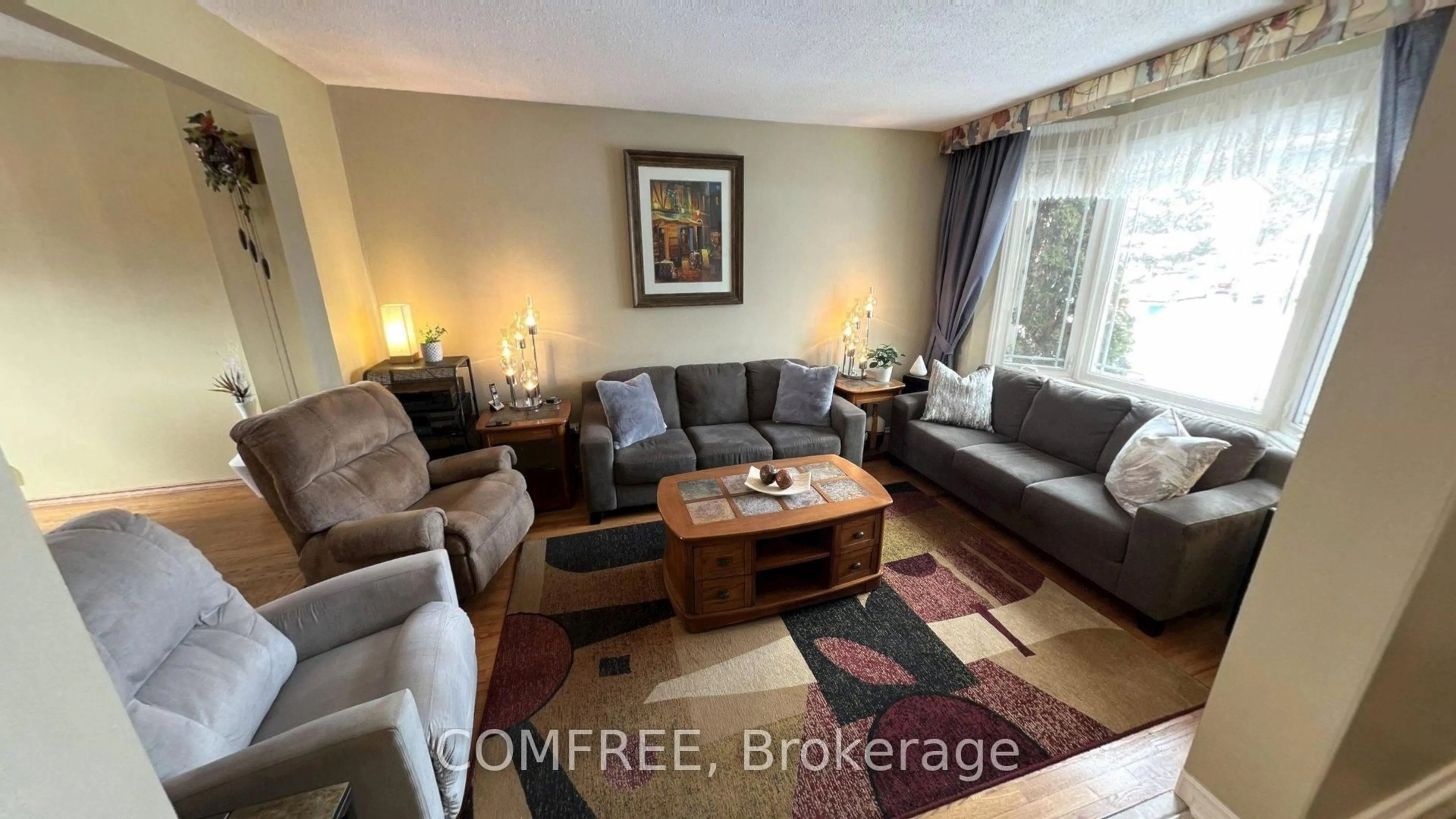 Living room with furniture, unknown for 56 Fieldgate Dr, Ottawa Ontario K2J 1T9