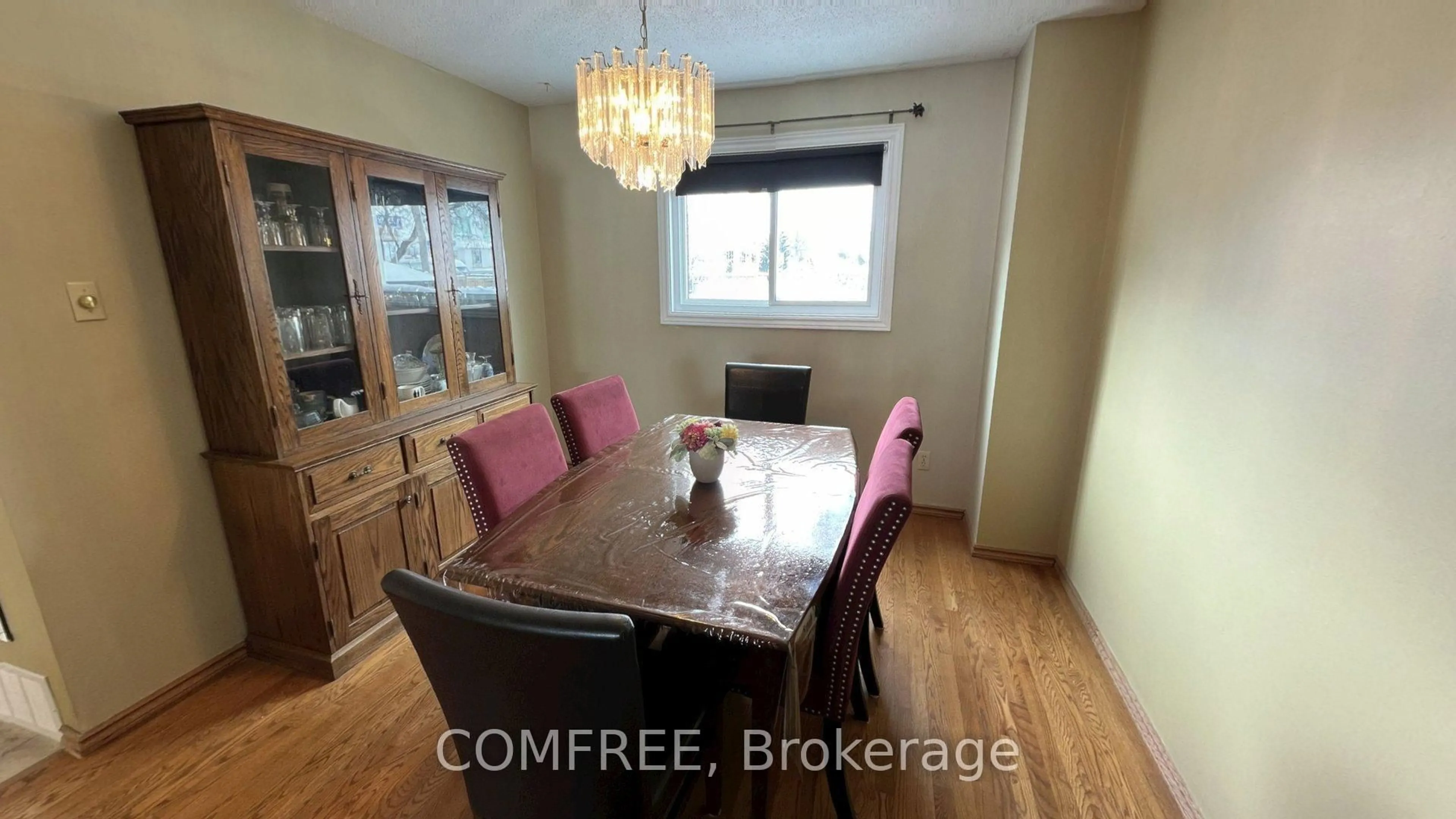 Dining room, wood/laminate floor for 56 Fieldgate Dr, Ottawa Ontario K2J 1T9