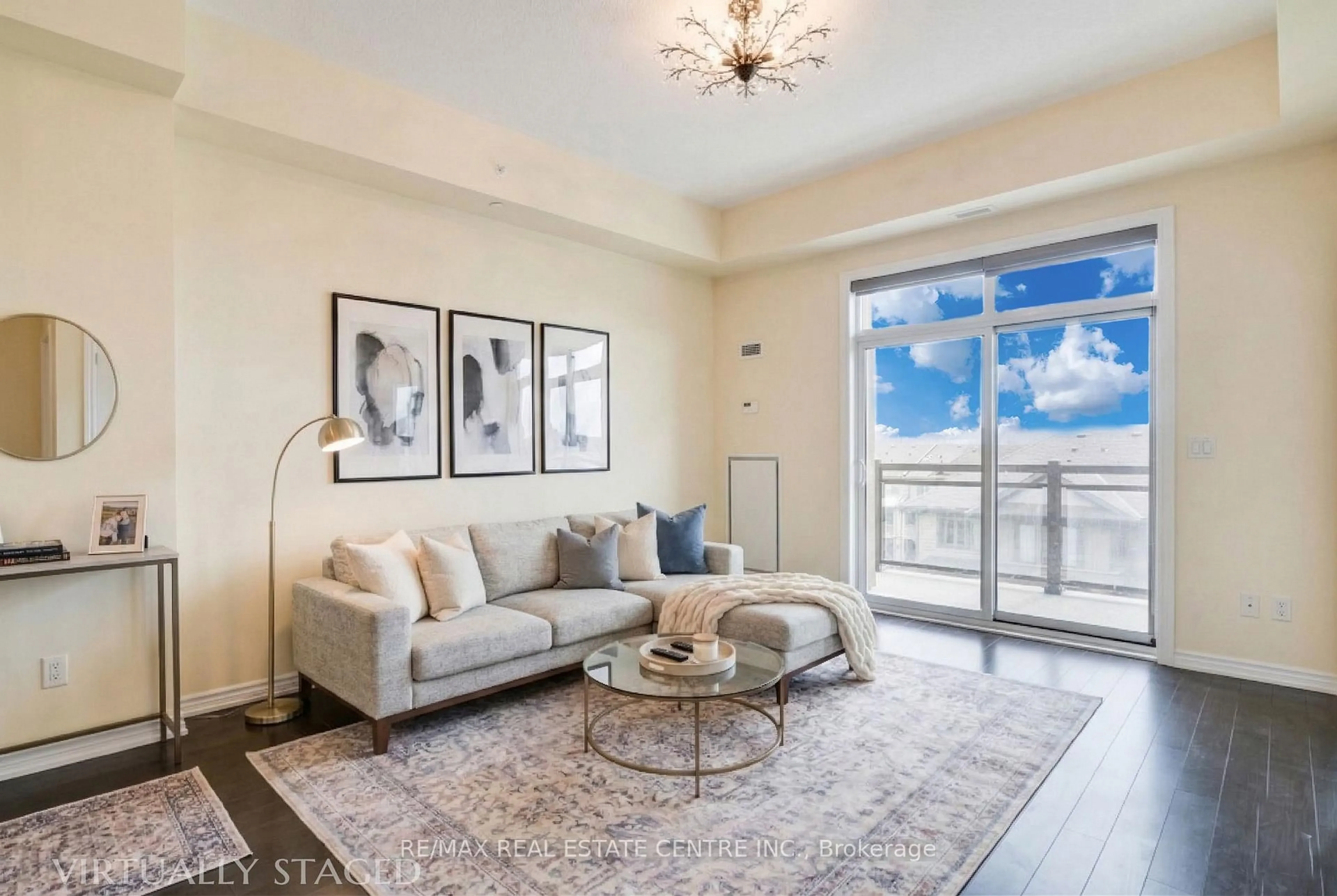 Living room with furniture, unknown for 35 Southshore Cres #413, Hamilton Ontario L8E 0J2