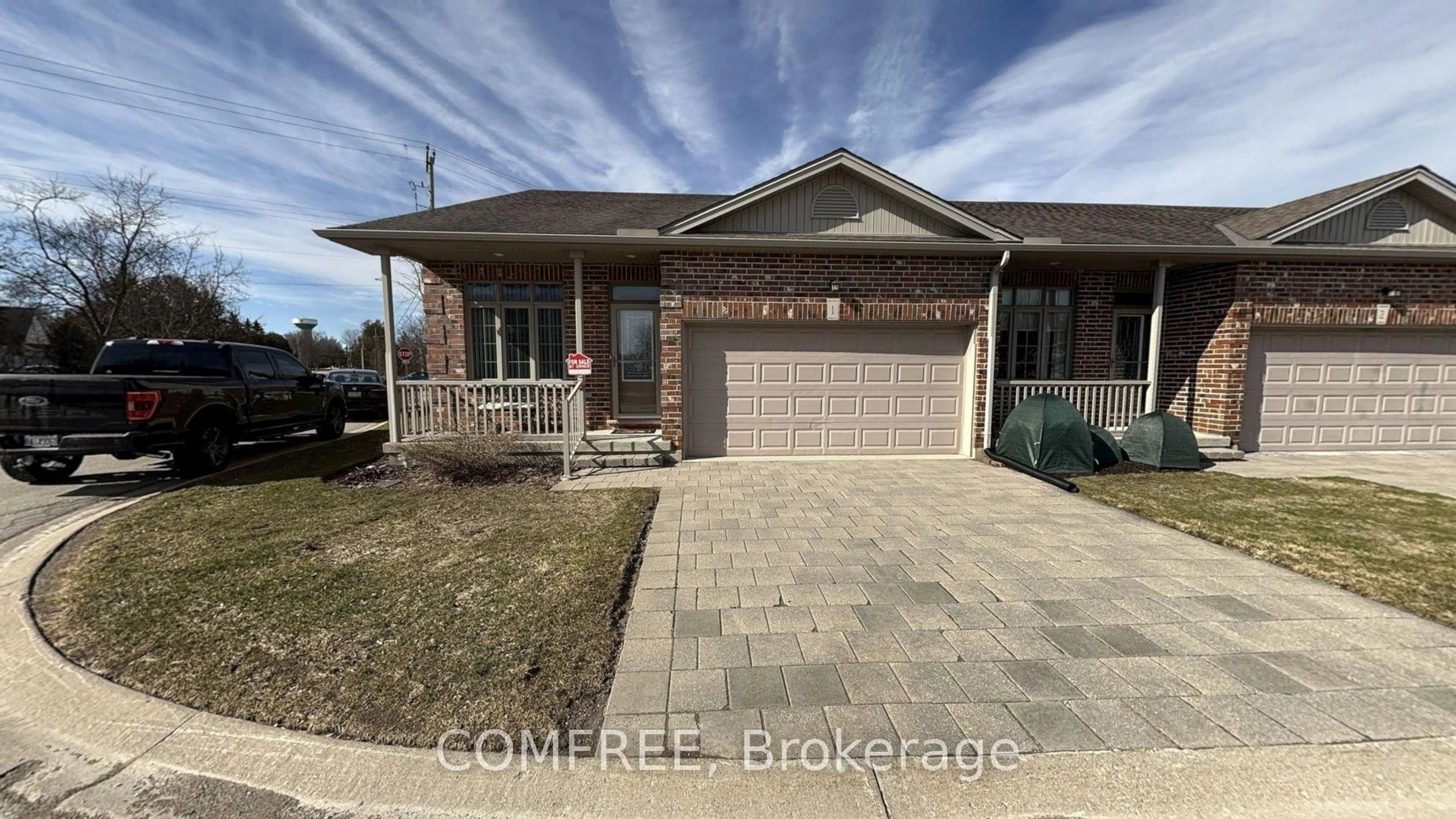 Home with brick exterior material, street for 220 Walnut St #1, Lucan Biddulph Ontario N0M 2J0