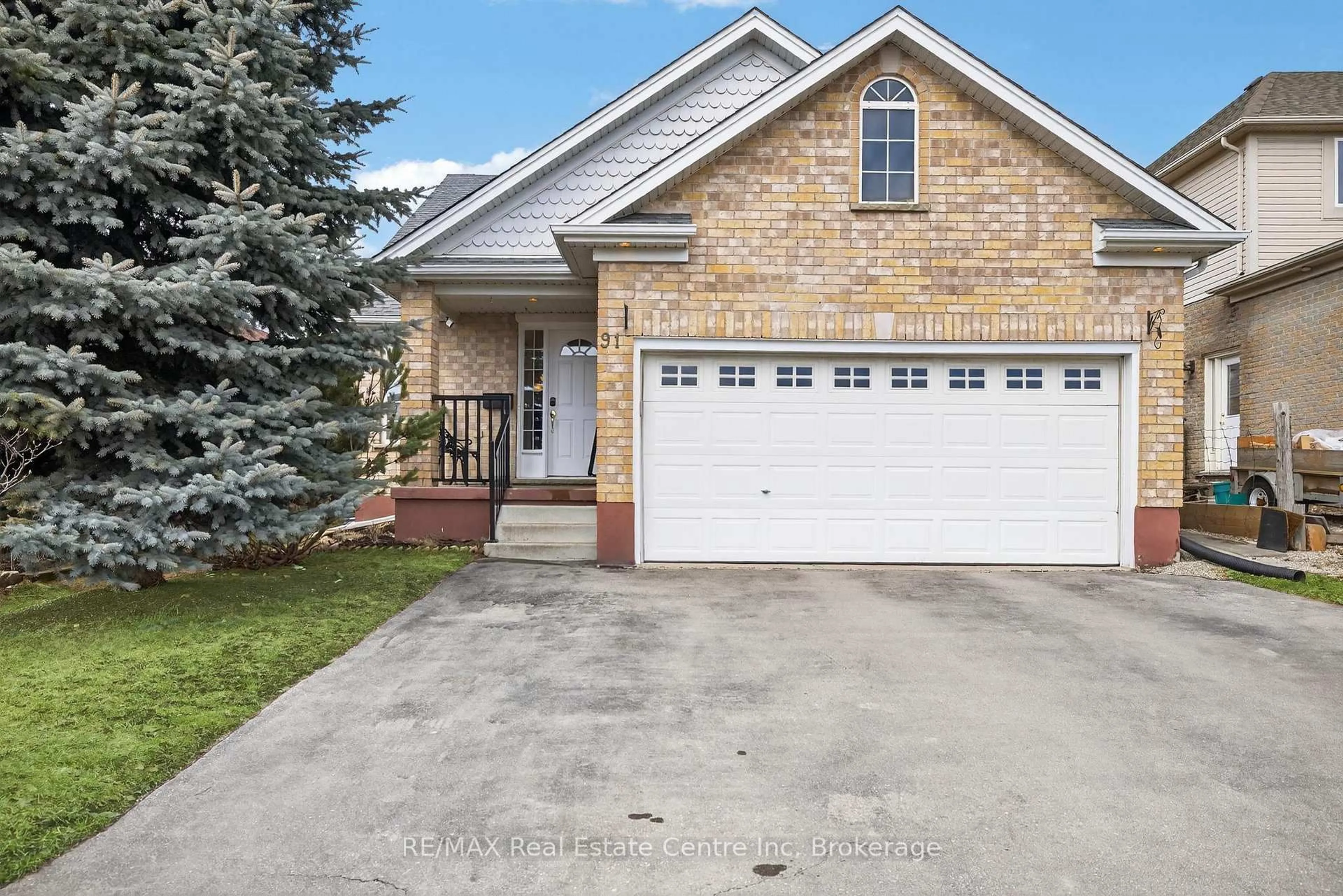 Home with brick exterior material, street for 91 Flaherty Dr, Guelph Ontario N1K 1Y7