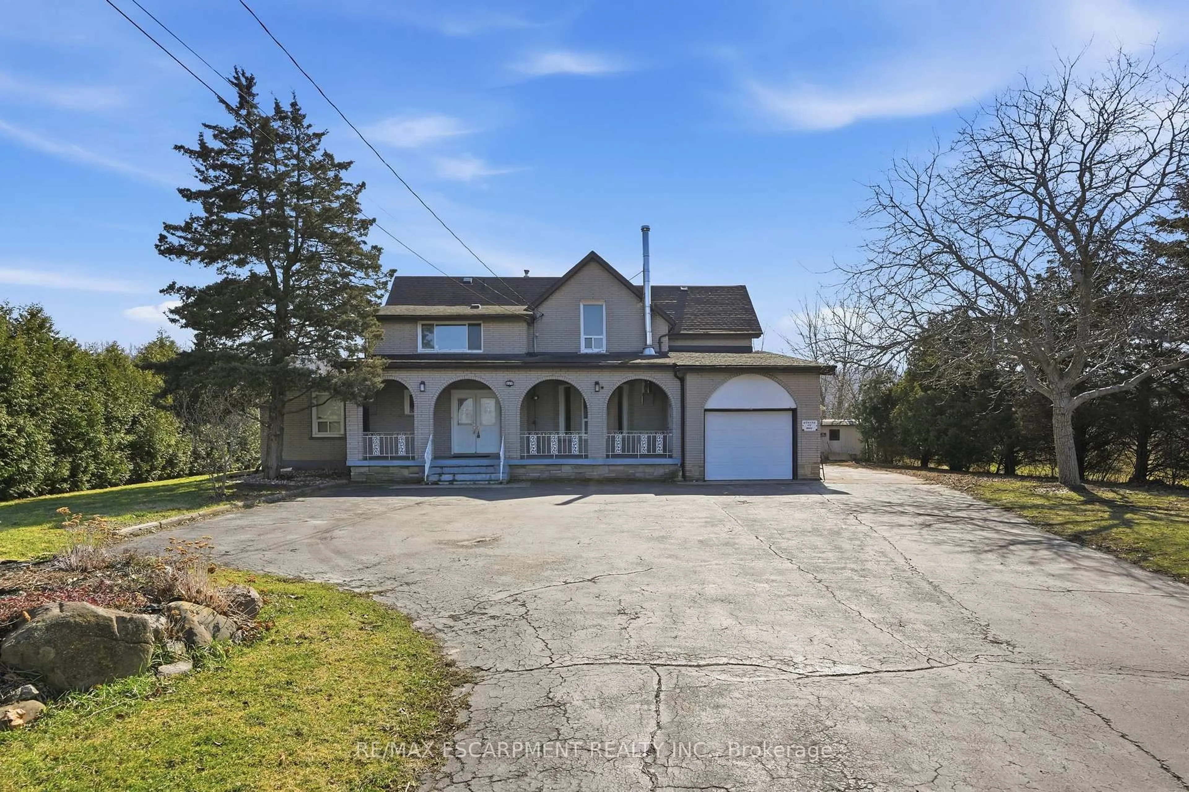 A pic from outside/outdoor area/front of a property/back of a property/a pic from drone, street for 864 Highway 8, Hamilton Ontario L8E 5J3