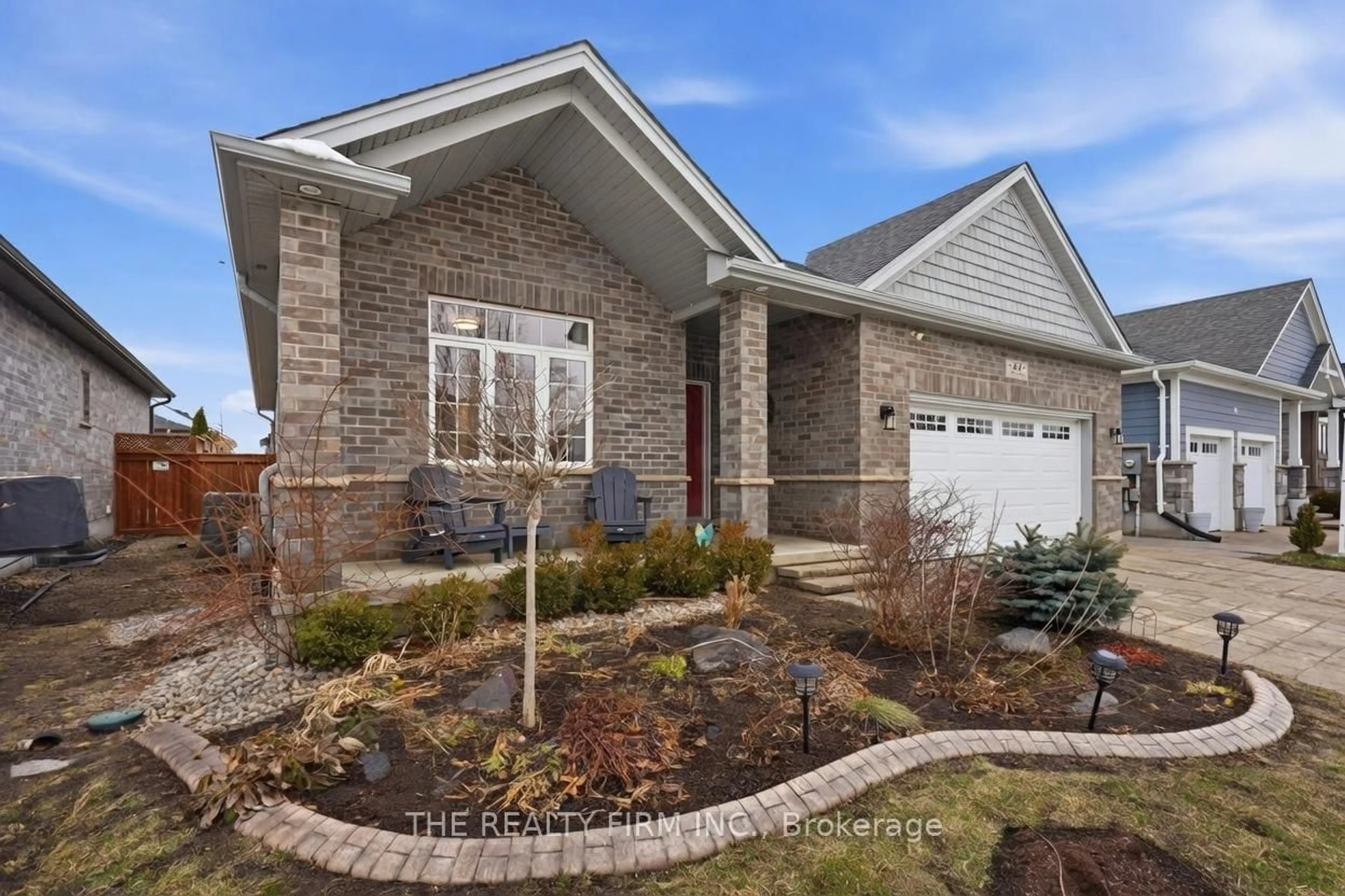Home with brick exterior material, street for 84 Collins Way, Strathroy-Caradoc Ontario N7G 0G2