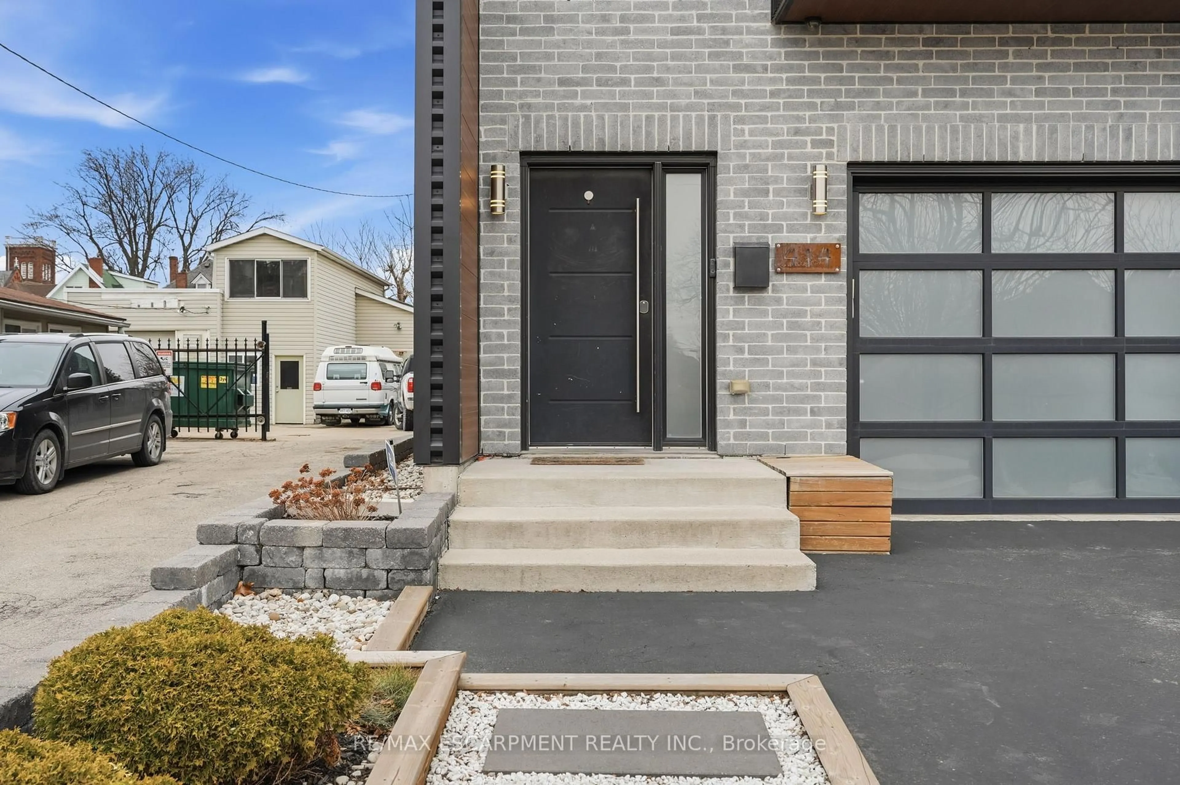 Home with brick exterior material, street for 414 JOHN St, Hamilton Ontario L8L 4R3