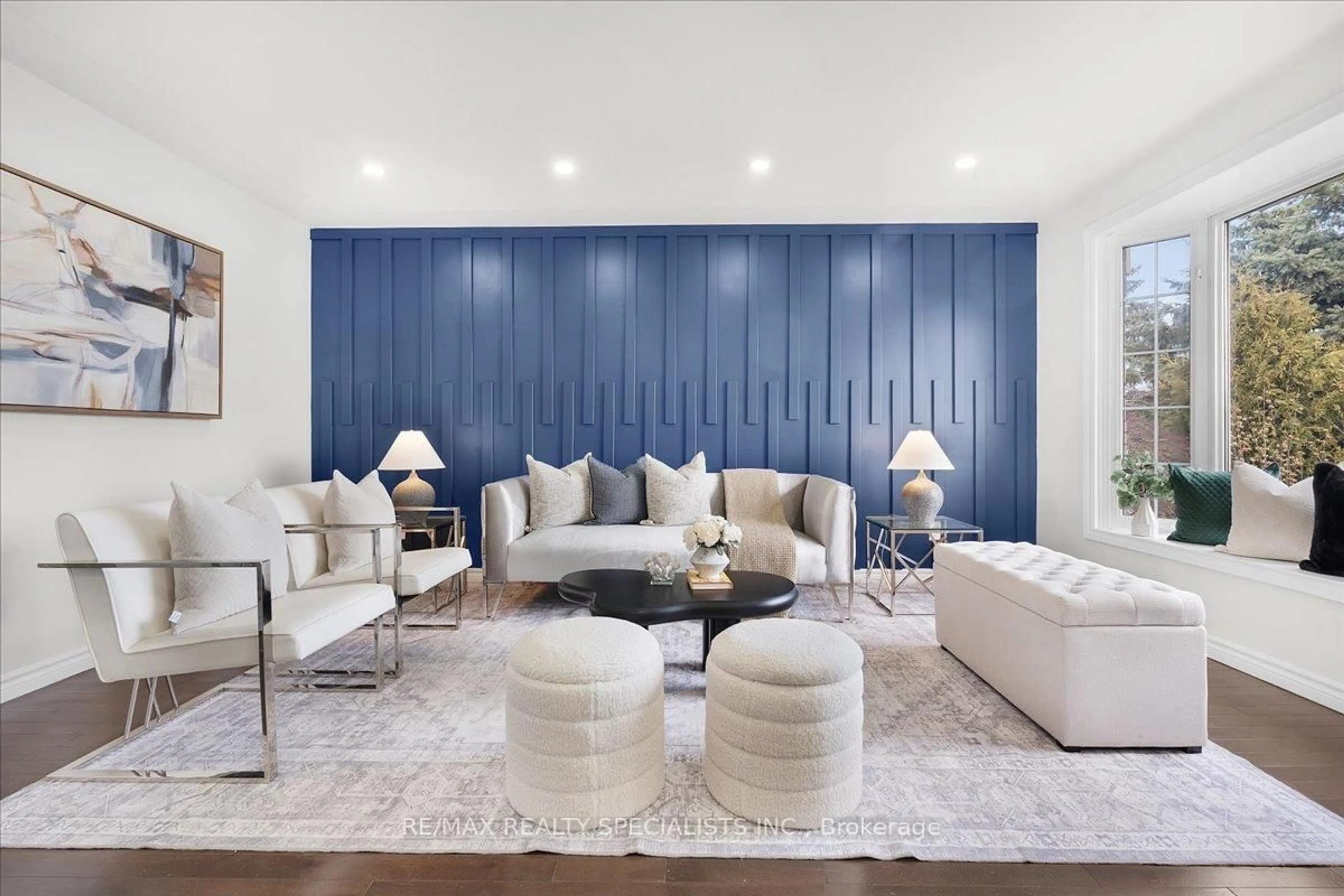 Living room with furniture, wood/laminate floor for 56 Nash Rd, Hamilton Ontario L8K 4J7