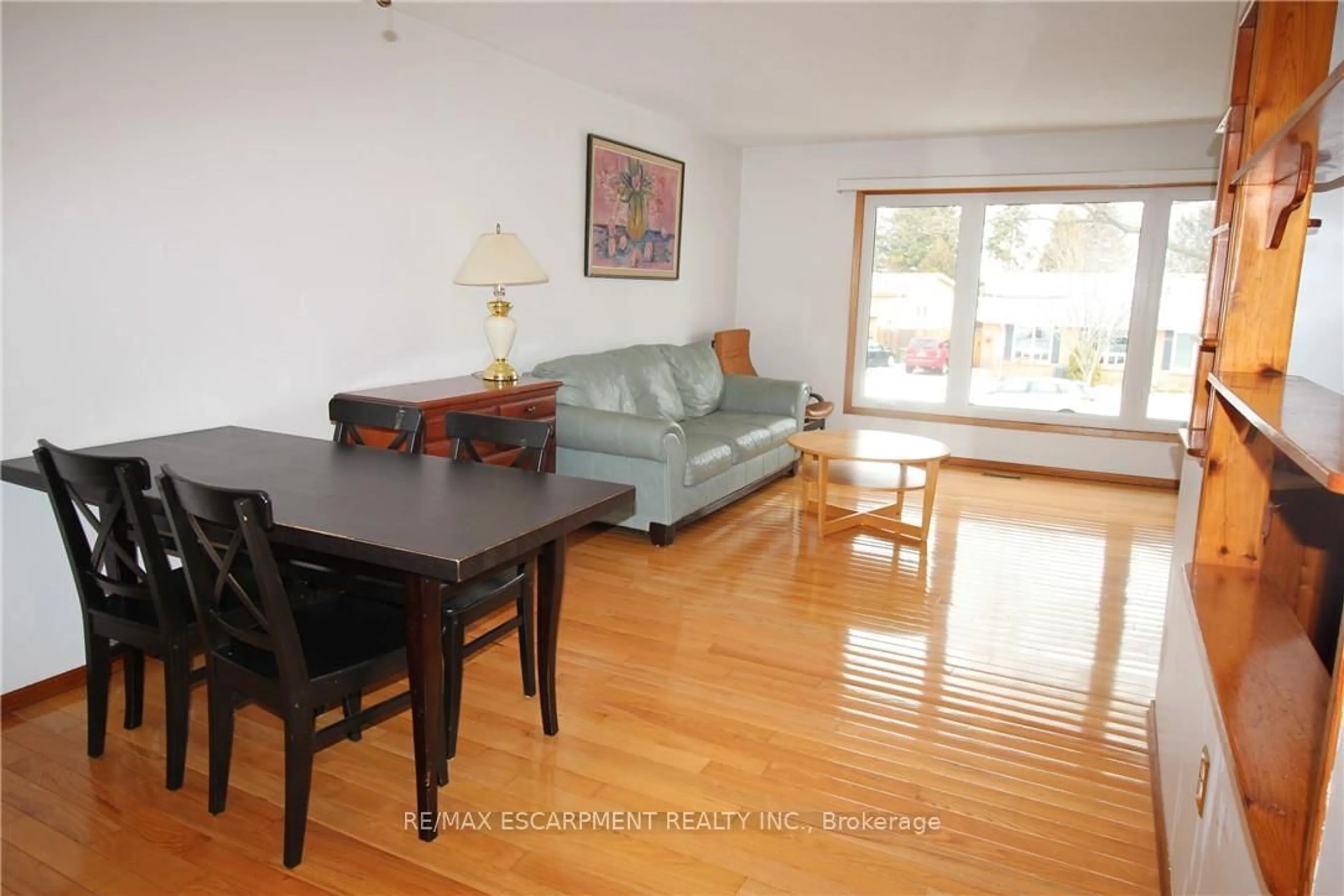 Living room with furniture, wood/laminate floor for 234 Greencedar Dr, Hamilton Ontario L9C 6W6