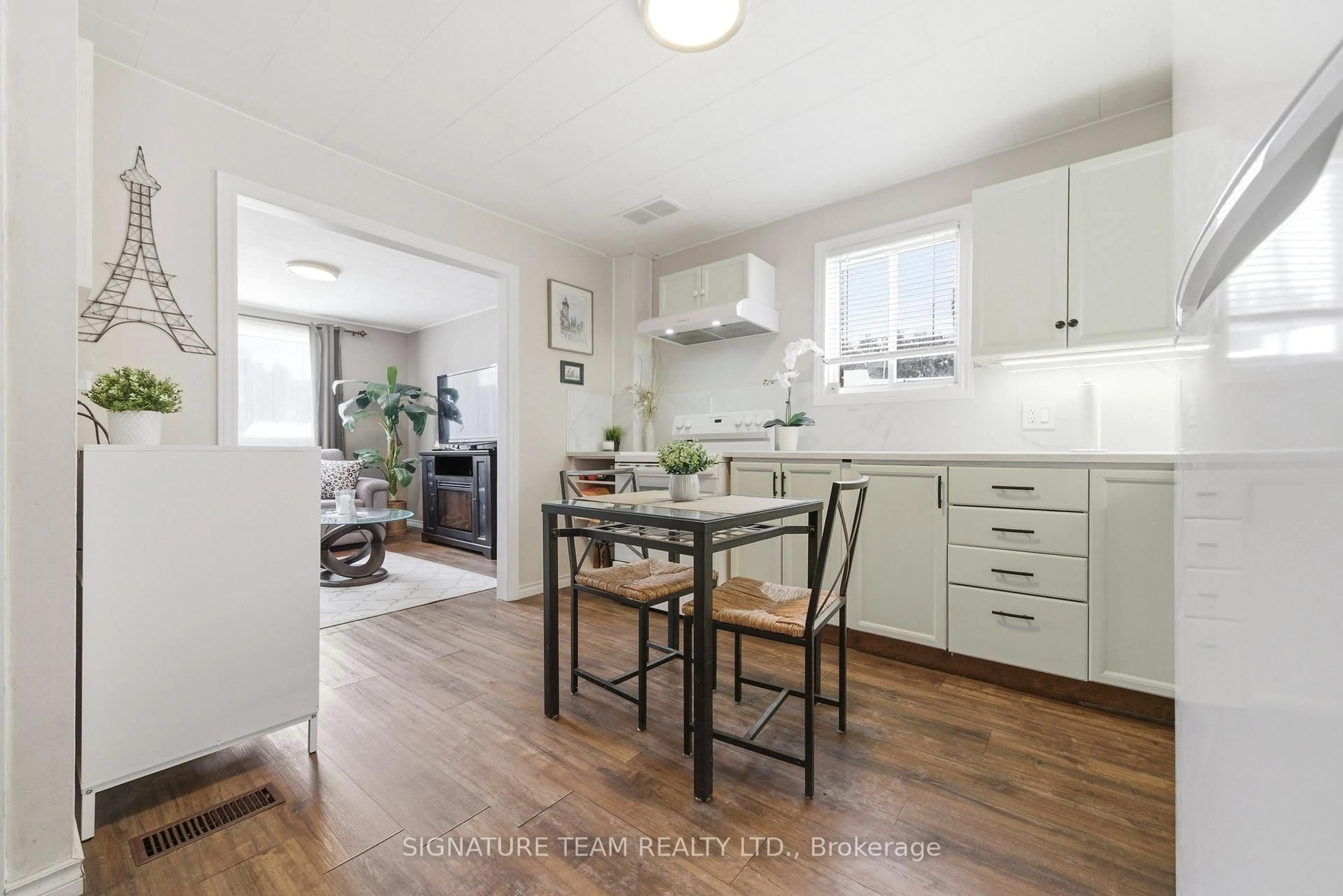 Open concept kitchen, wood/laminate floor for 2683 Round Lake Rd, Round Lake Centre Ontario K0J 2J0