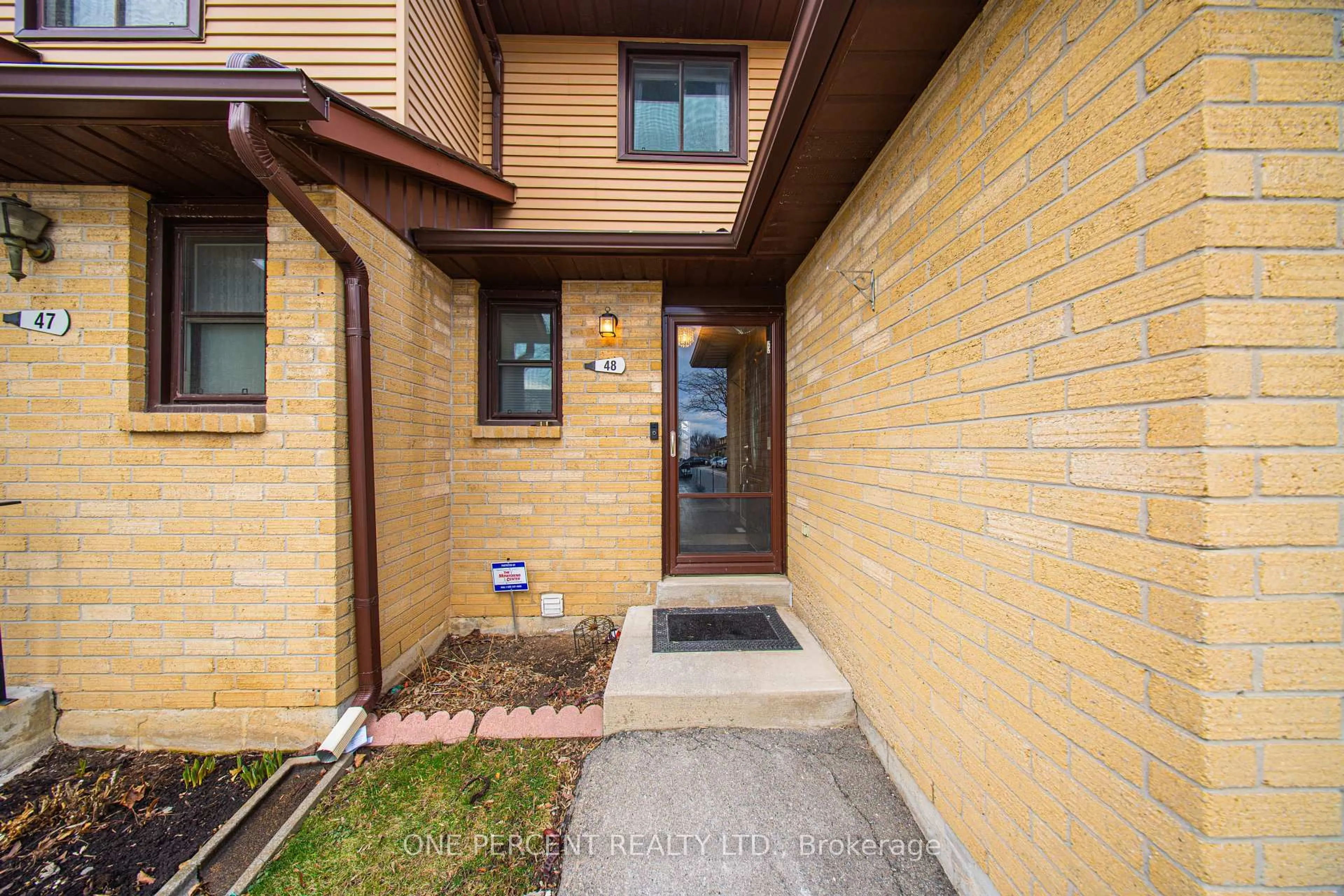 Home with brick exterior material, street for 860 Rymal Rd #48, Hamilton Ontario L8W 2X6