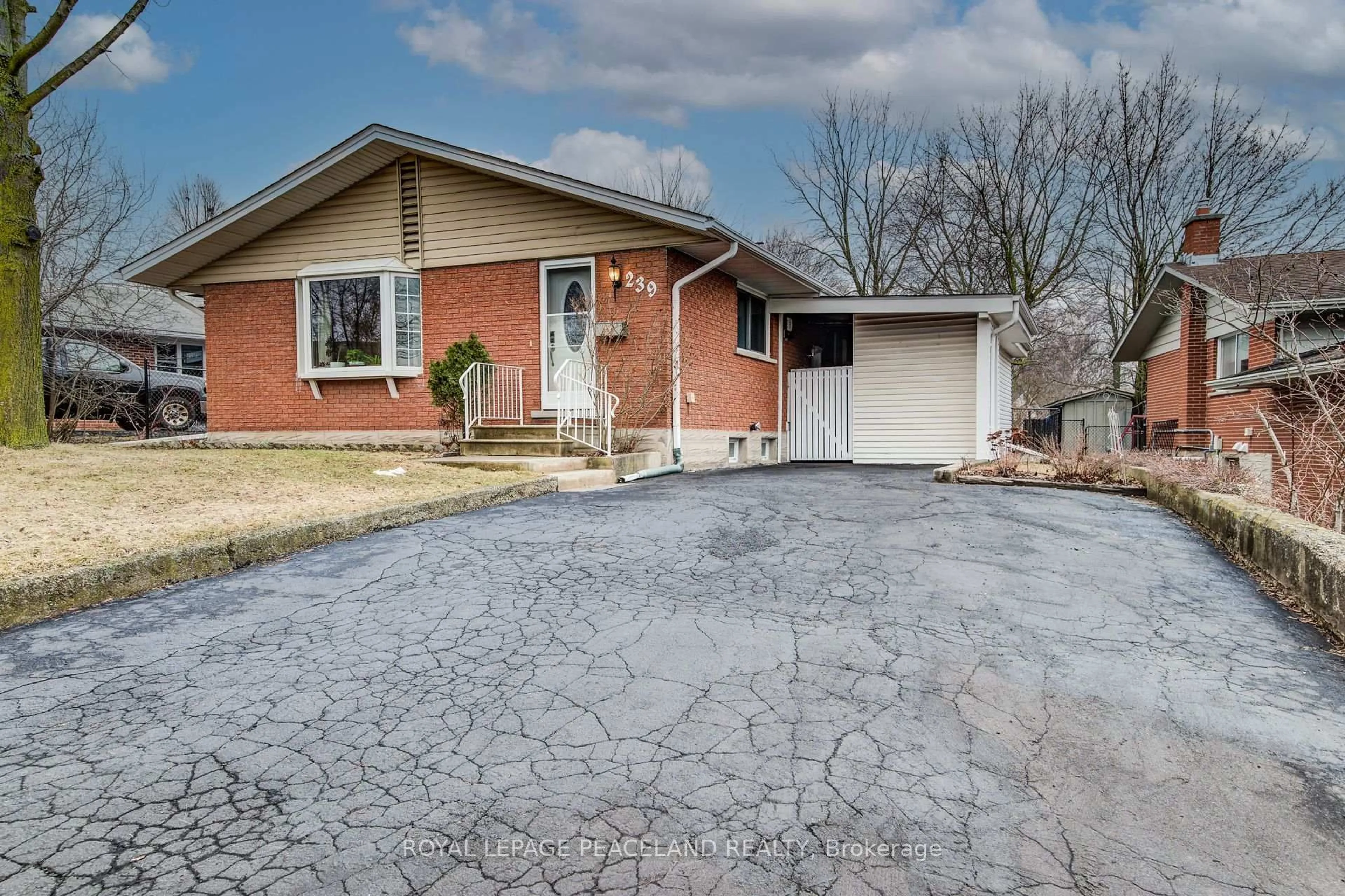 Home with brick exterior material, street for 239 Winfield Ave, Waterloo Ontario N2J 3M8
