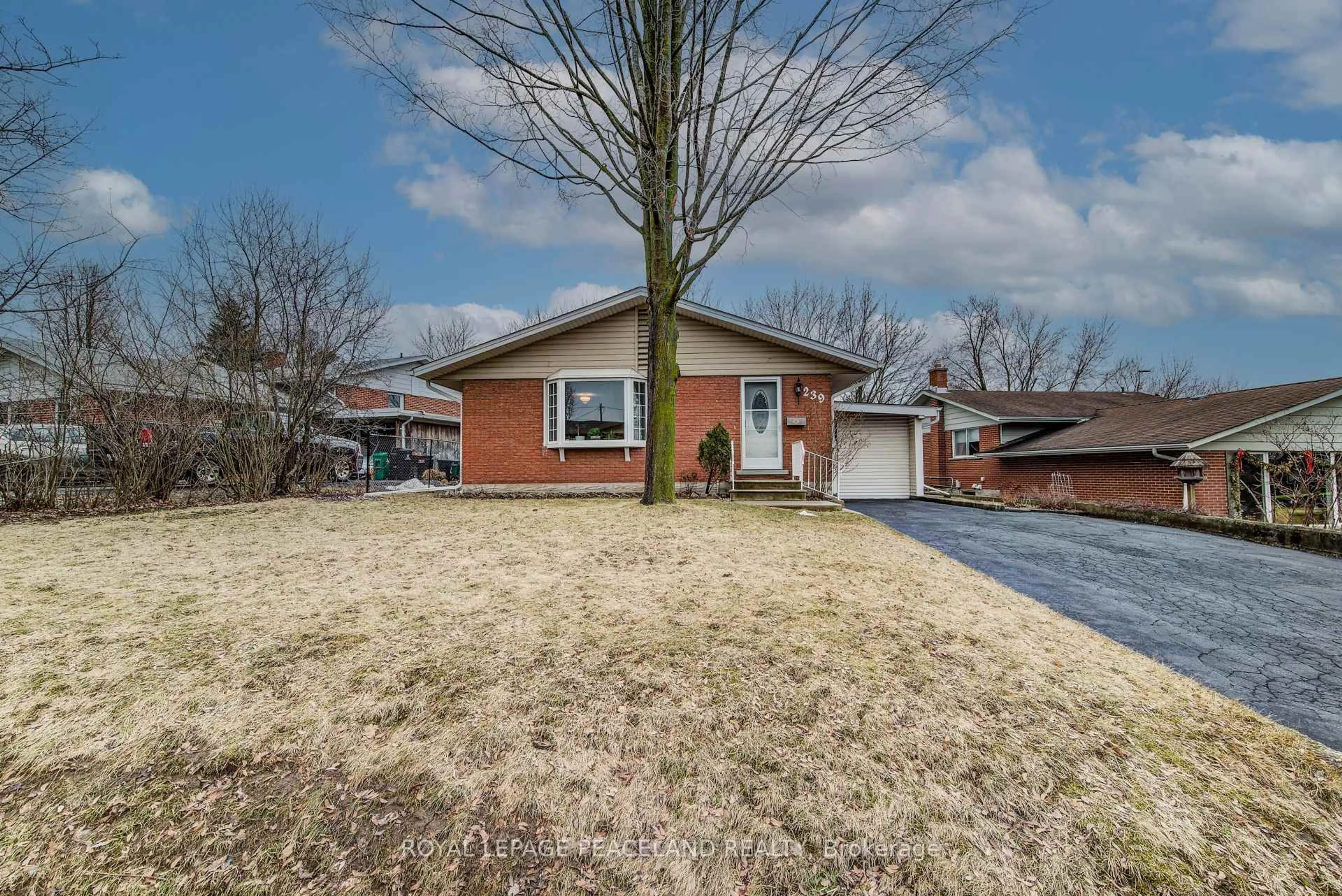Home with brick exterior material, street for 239 Winfield Ave, Waterloo Ontario N2J 3M8