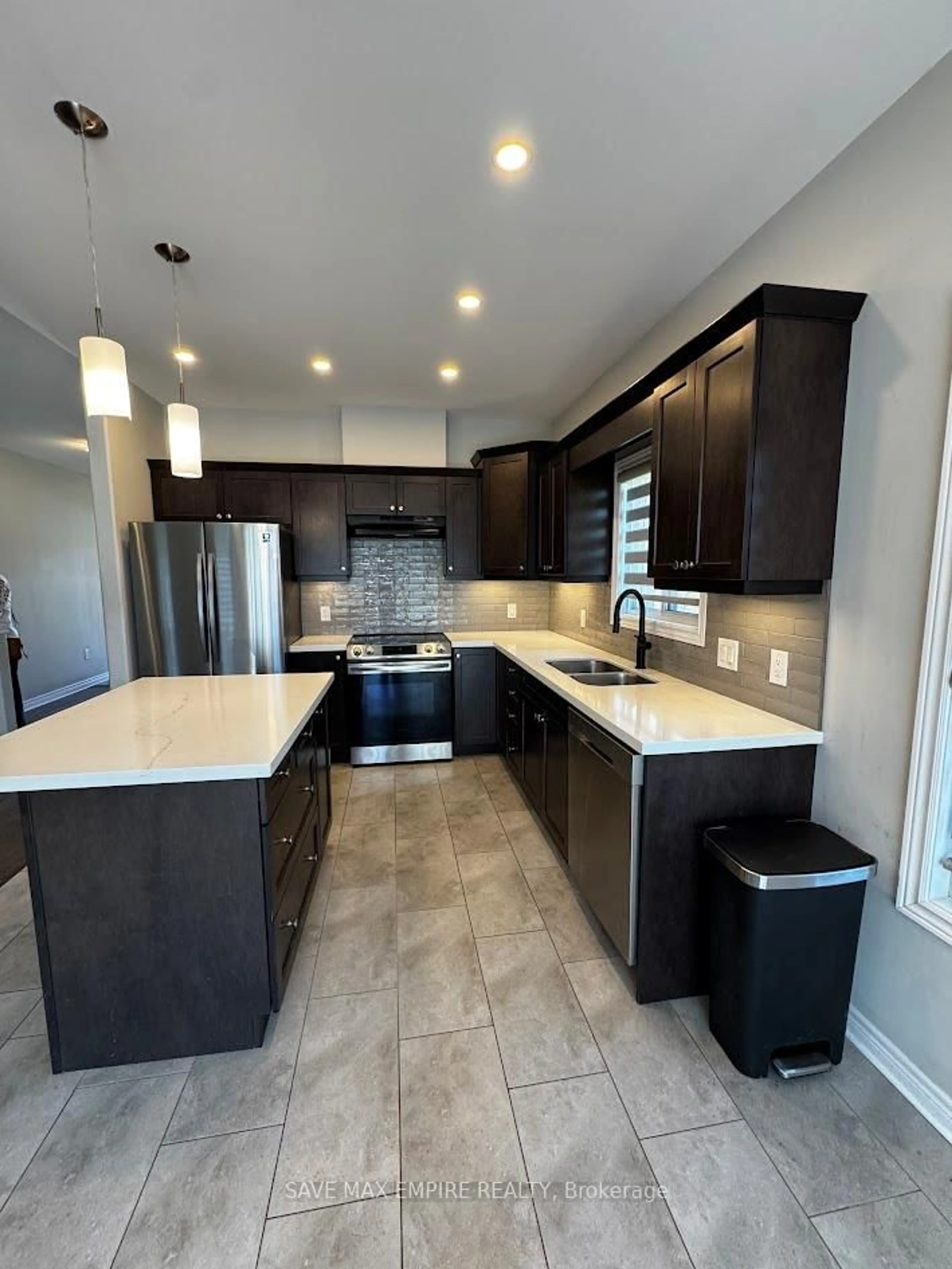 Open concept kitchen, ceramic/tile floor for 1209 Uppers Lane, Thorold Ontario L2V 0H1