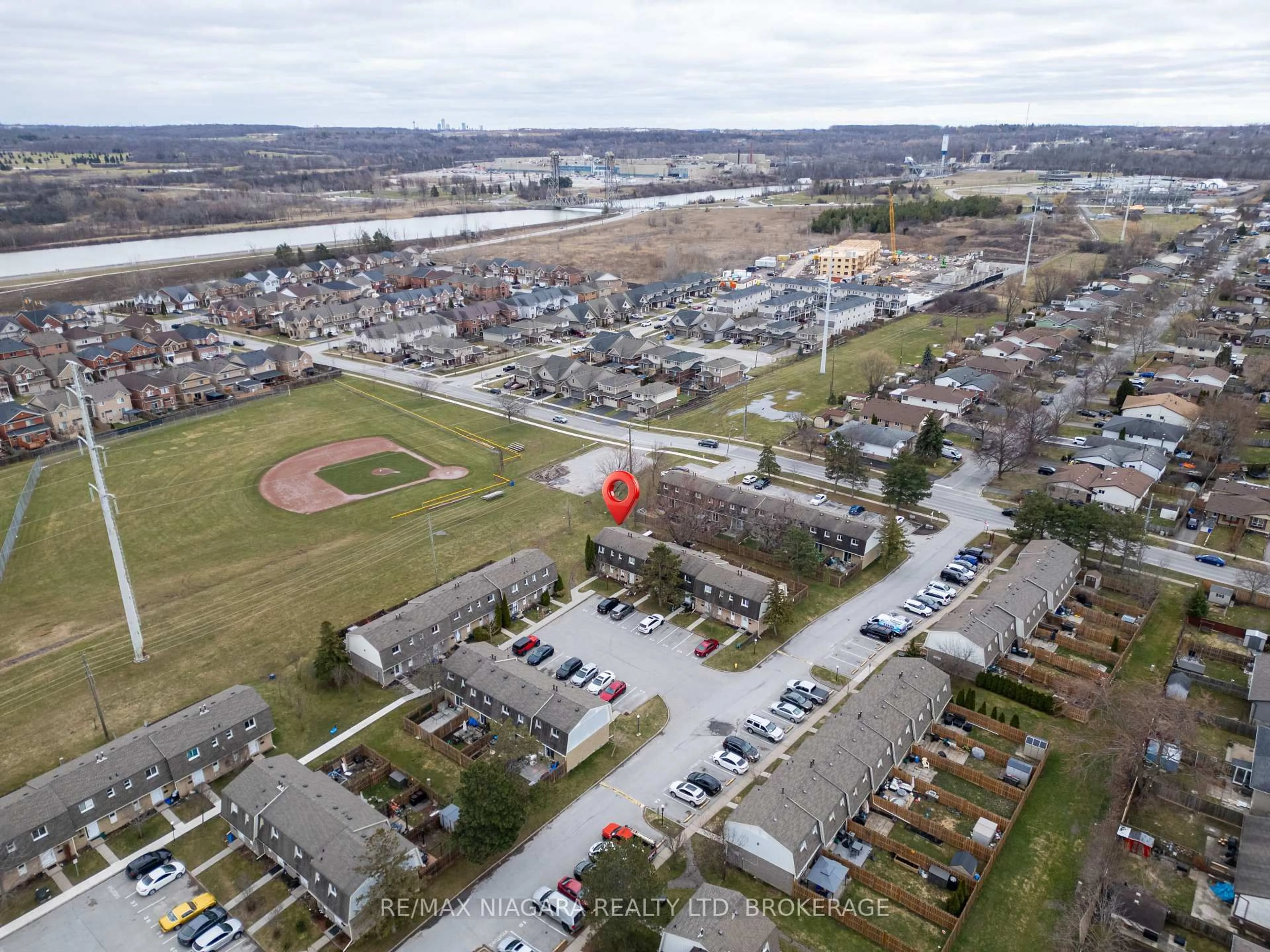 A pic from outside/outdoor area/front of a property/back of a property/a pic from drone, unknown for 131 Rockwood Ave #55, St. Catharines Ontario L2P 3K4