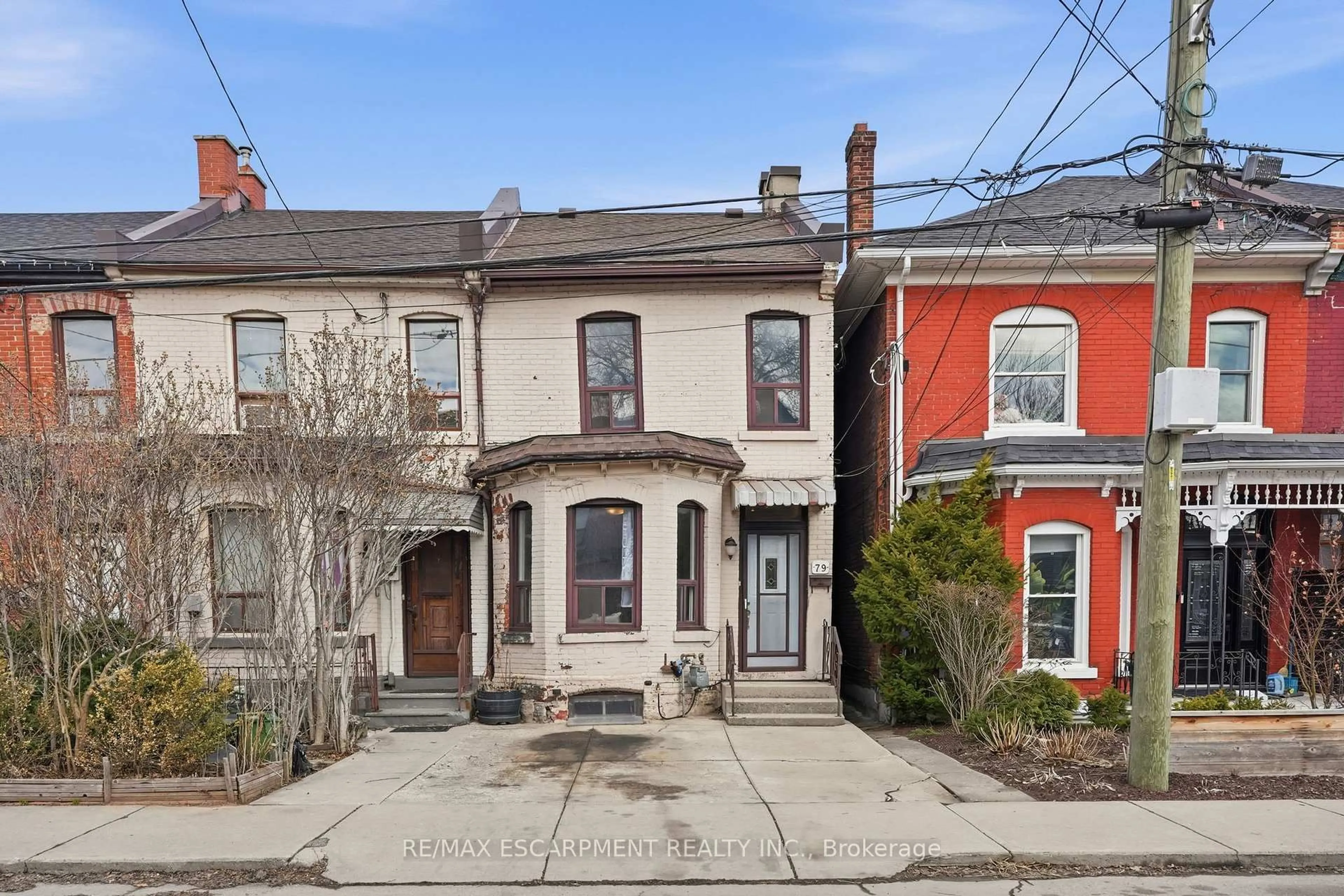 Home with brick exterior material, street for 79 Murray St, Hamilton Ontario L8L 3G1