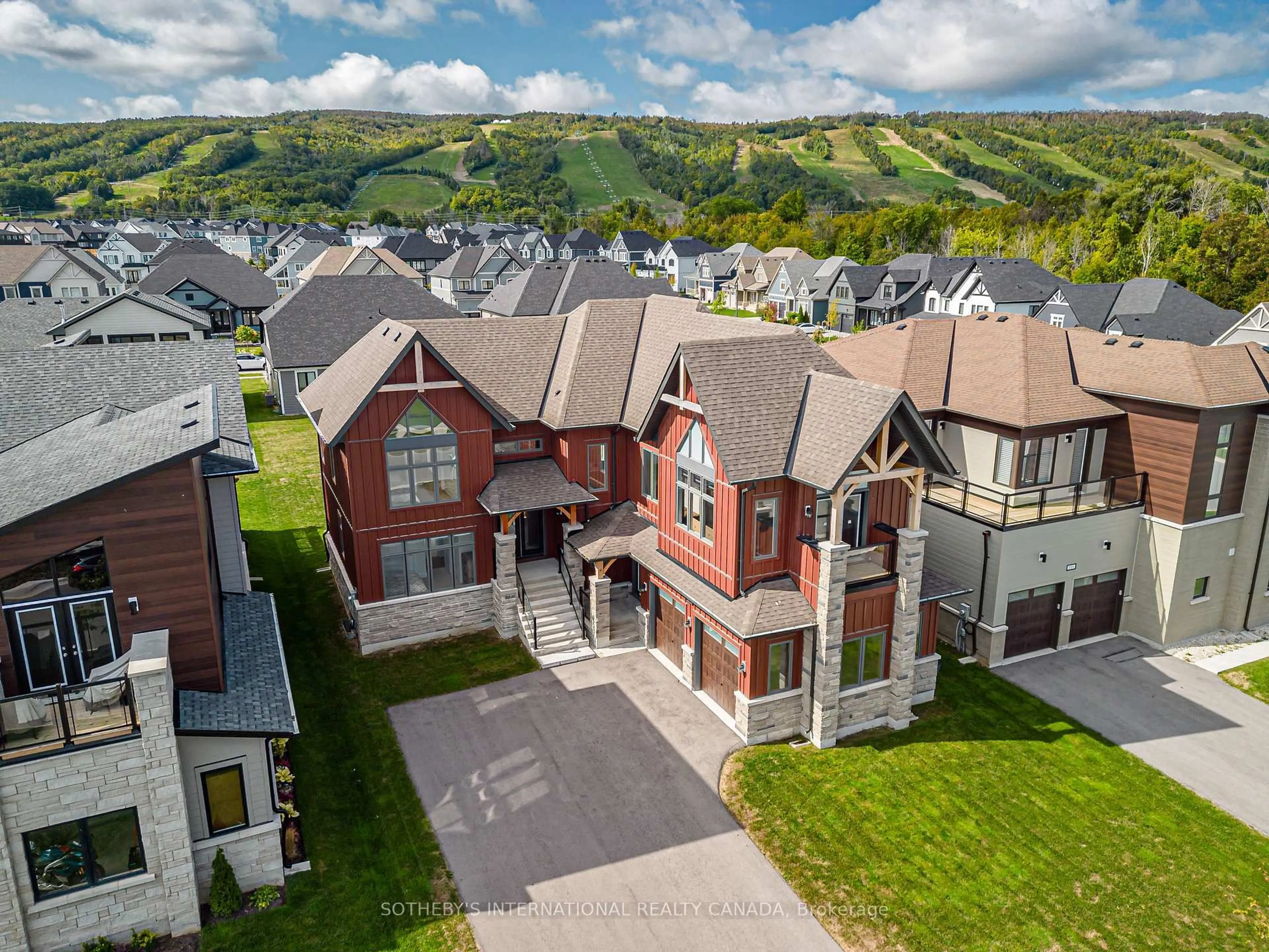 A pic from outside/outdoor area/front of a property/back of a property/a pic from drone, mountain view for 103 Stoneleigh Dr, Blue Mountains Ontario L9Y 4P5