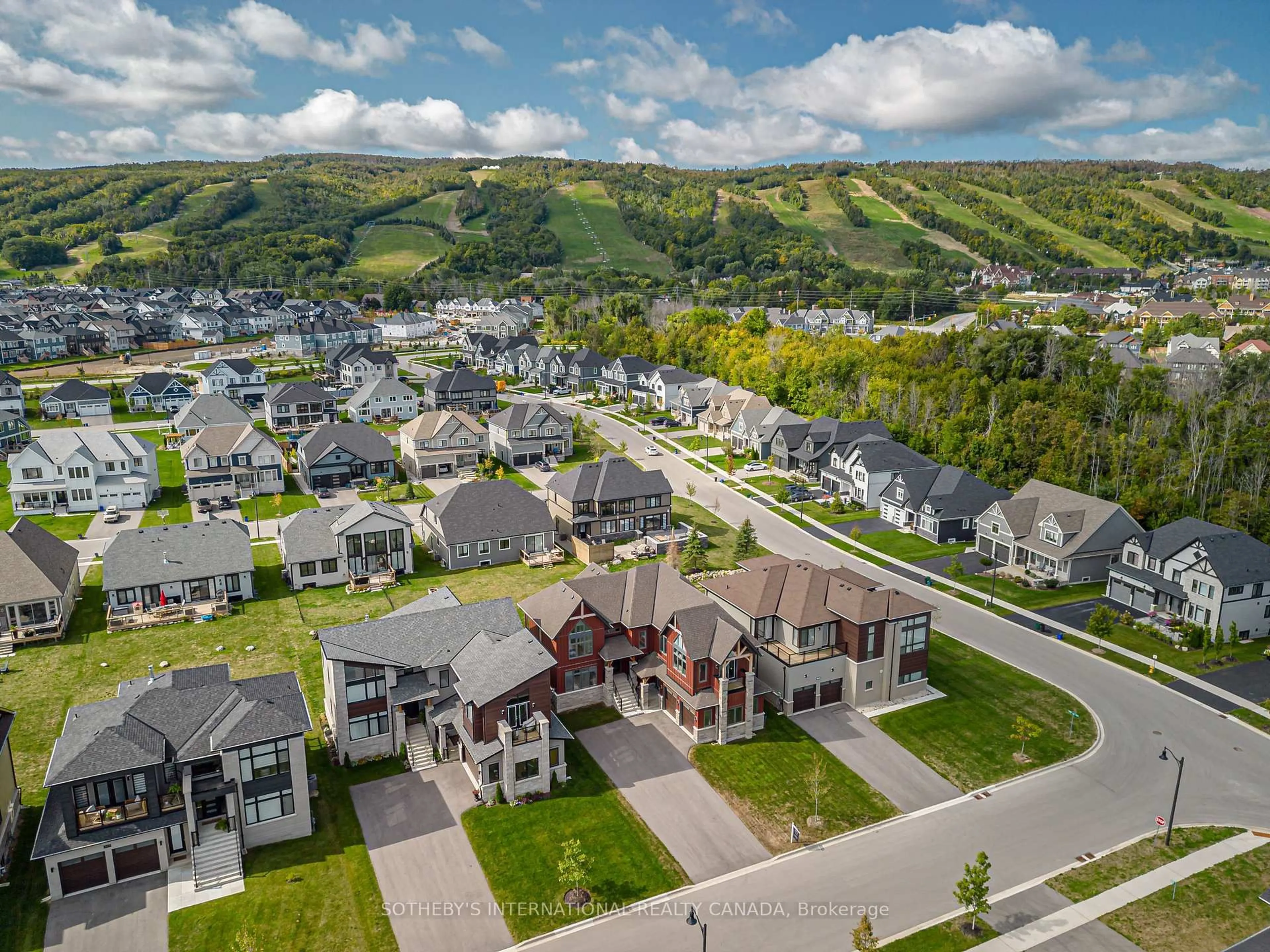 A pic from outside/outdoor area/front of a property/back of a property/a pic from drone, mountain view for 103 Stoneleigh Dr, Blue Mountains Ontario L9Y 4P5