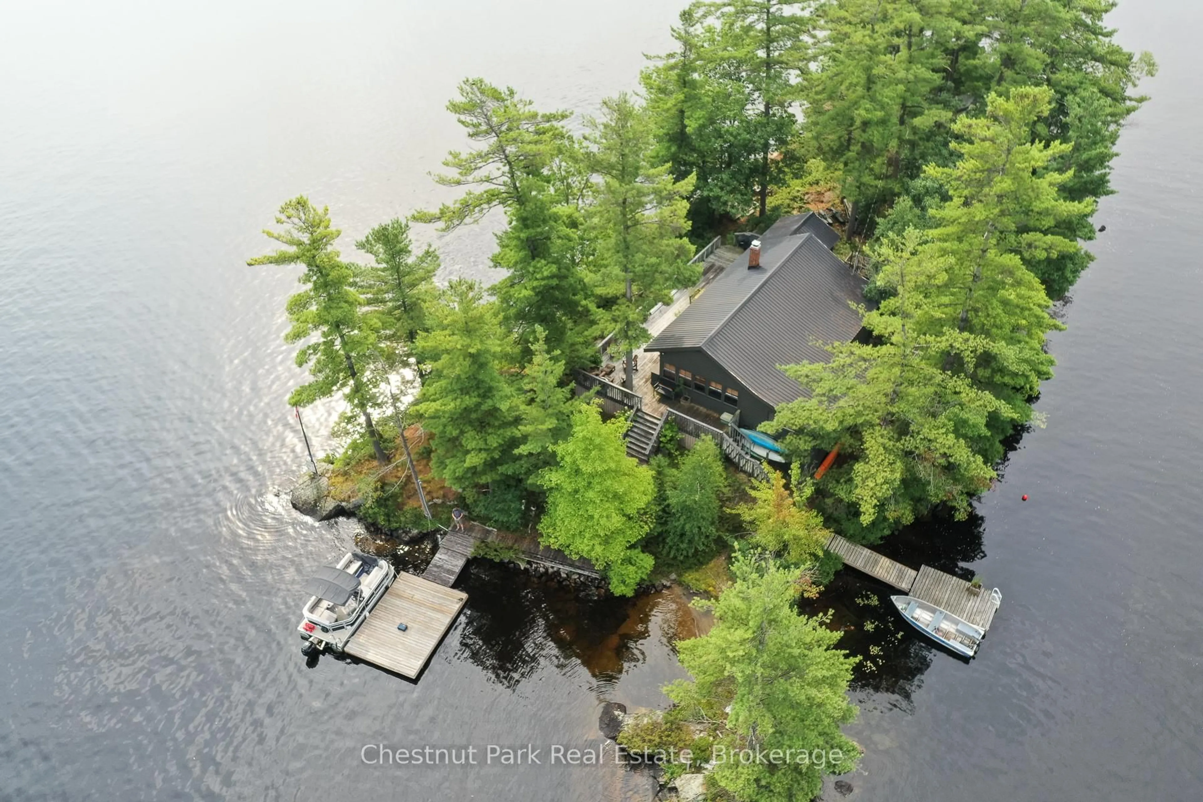 A pic from outside/outdoor area/front of a property/back of a property/a pic from drone, water/lake/river/ocean view for 1 ROSE ISLAND, Gravenhurst Ontario P0B 1G0