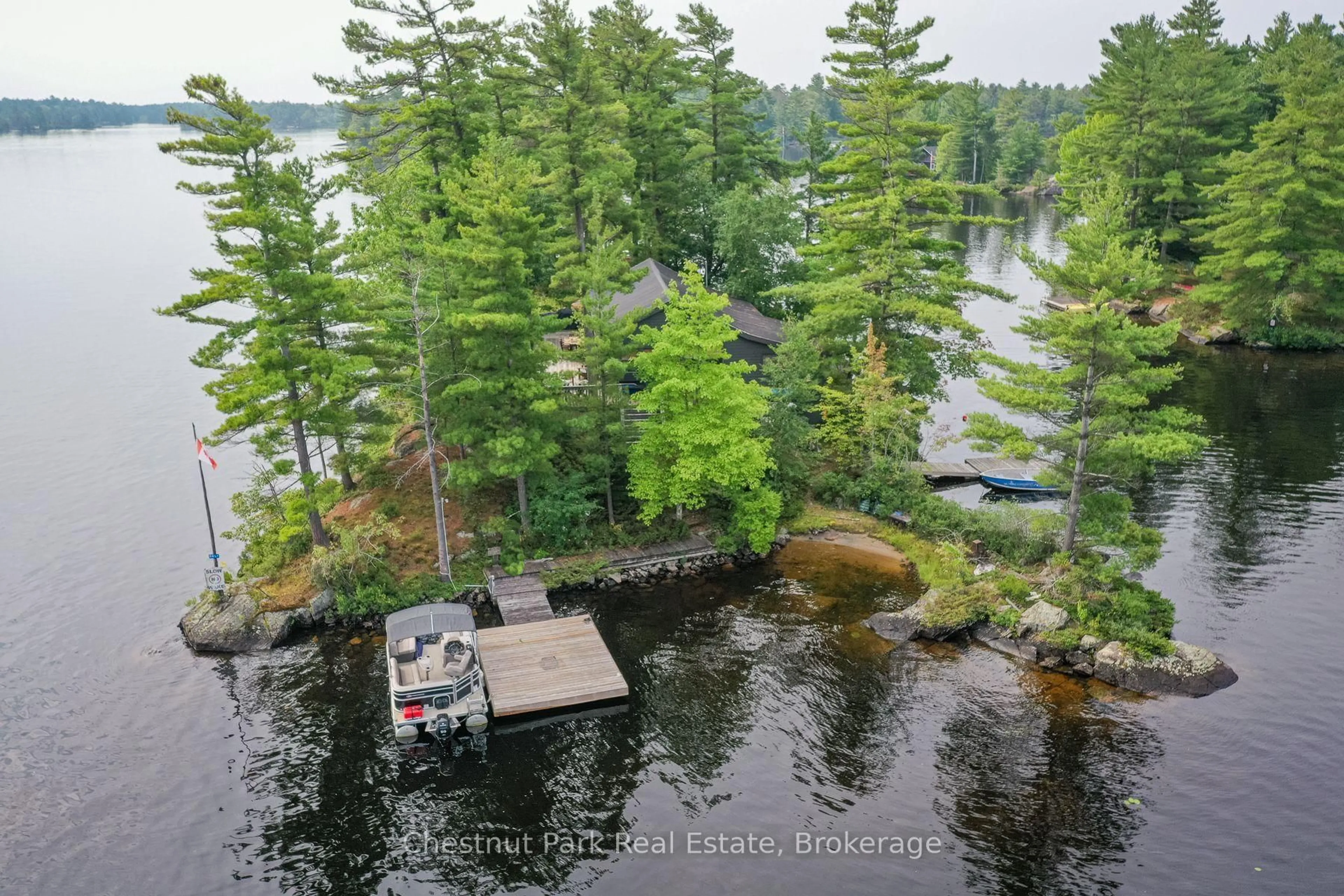 A pic from outside/outdoor area/front of a property/back of a property/a pic from drone, water/lake/river/ocean view for 1 ROSE ISLAND, Gravenhurst Ontario P0B 1G0