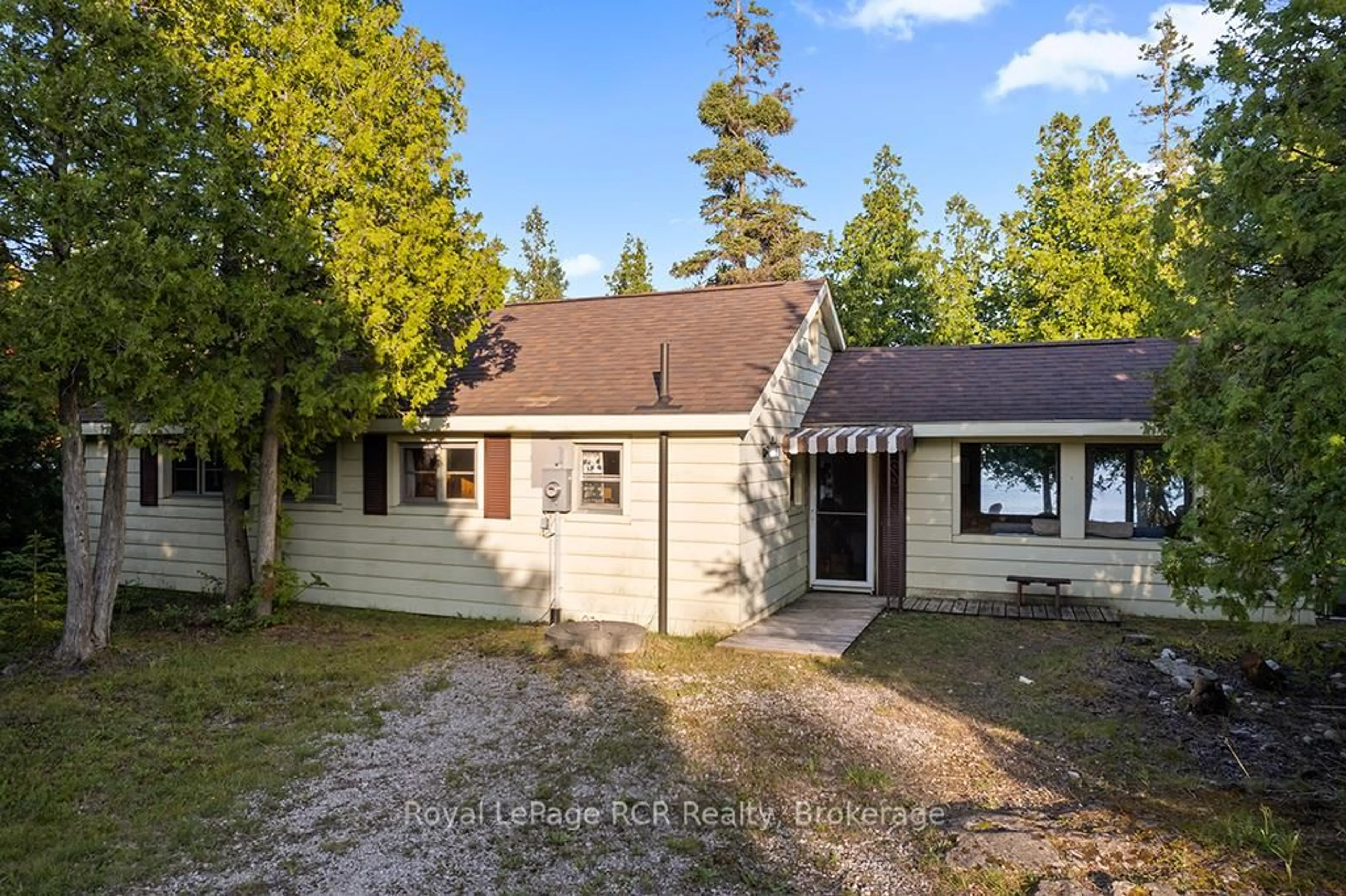 A pic from outside/outdoor area/front of a property/back of a property/a pic from drone, street for 403 Eagle Rd, Northern Bruce Peninsula Ontario N0H 2R0