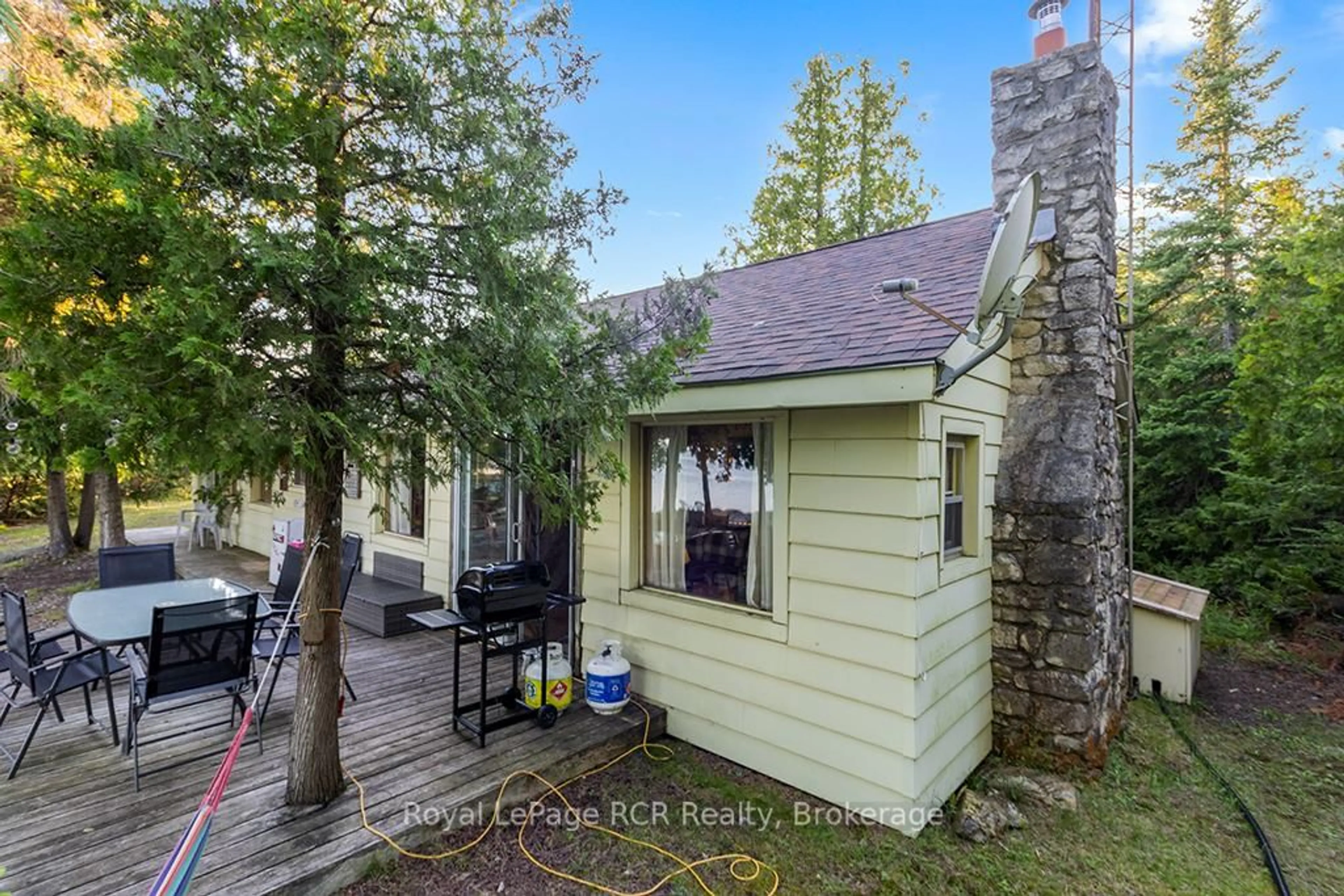 A pic from outside/outdoor area/front of a property/back of a property/a pic from drone, street for 403 Eagle Rd, Northern Bruce Peninsula Ontario N0H 2R0