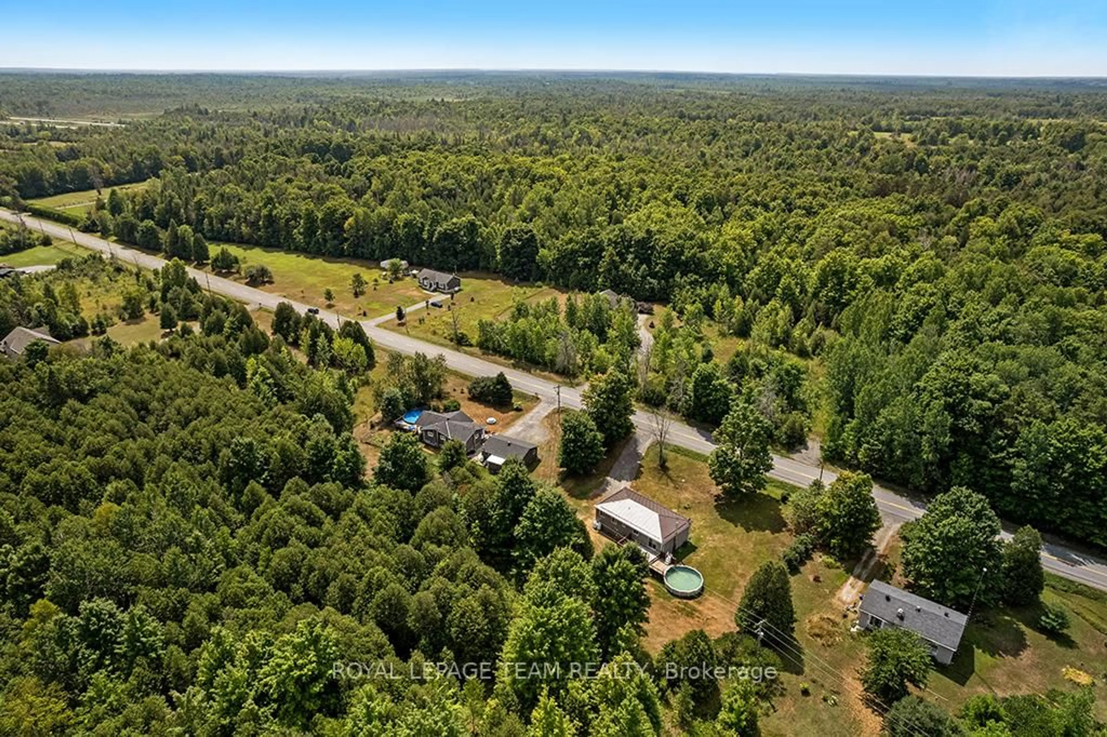A pic from outside/outdoor area/front of a property/back of a property/a pic from drone, forest/trees view for 8133 County Rd 44 Rd, Edwardsburgh/Cardinal Ontario K0E 1X0