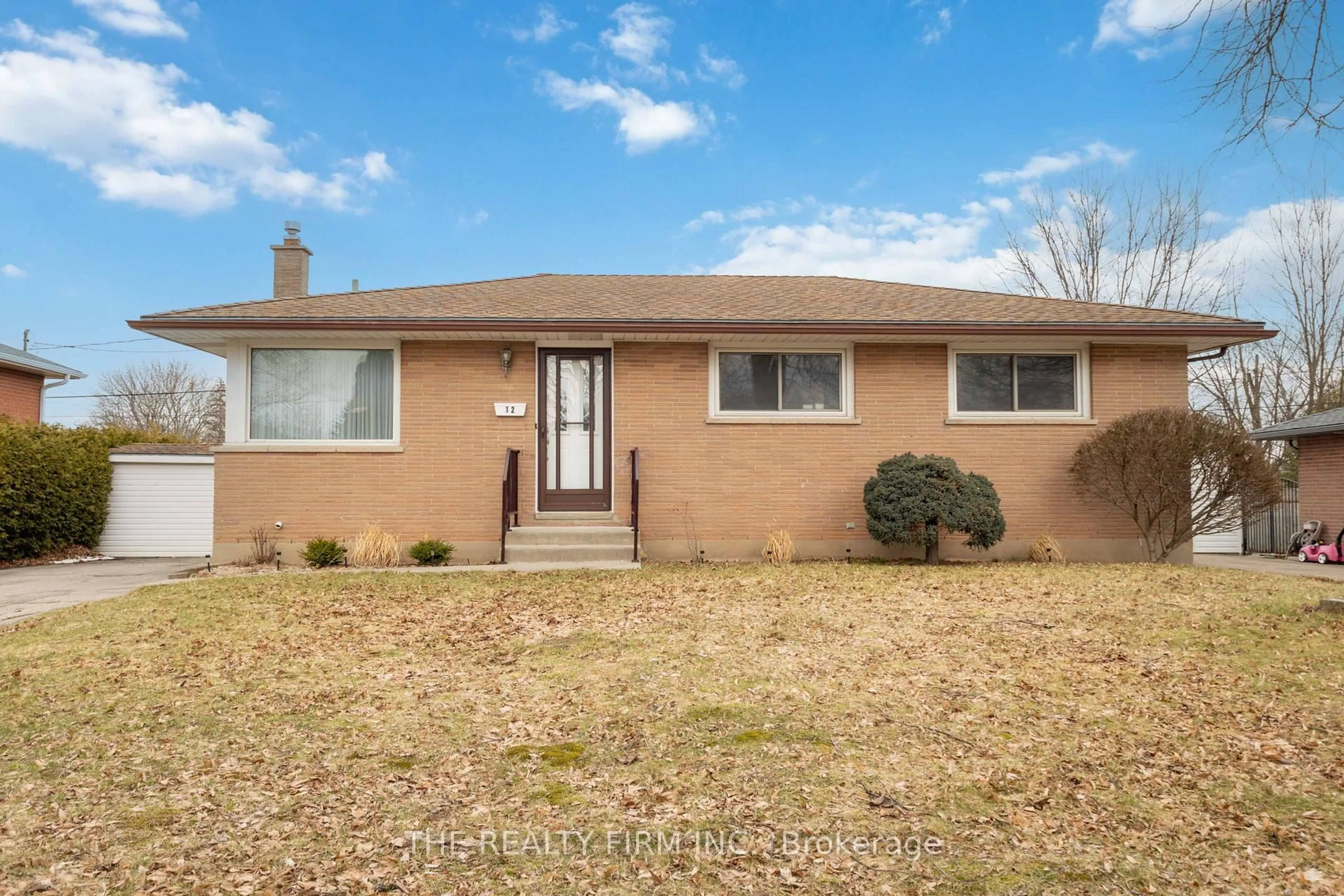 Home with brick exterior material, street for 12 Curtis Ave, London South Ontario N5Z 4G1