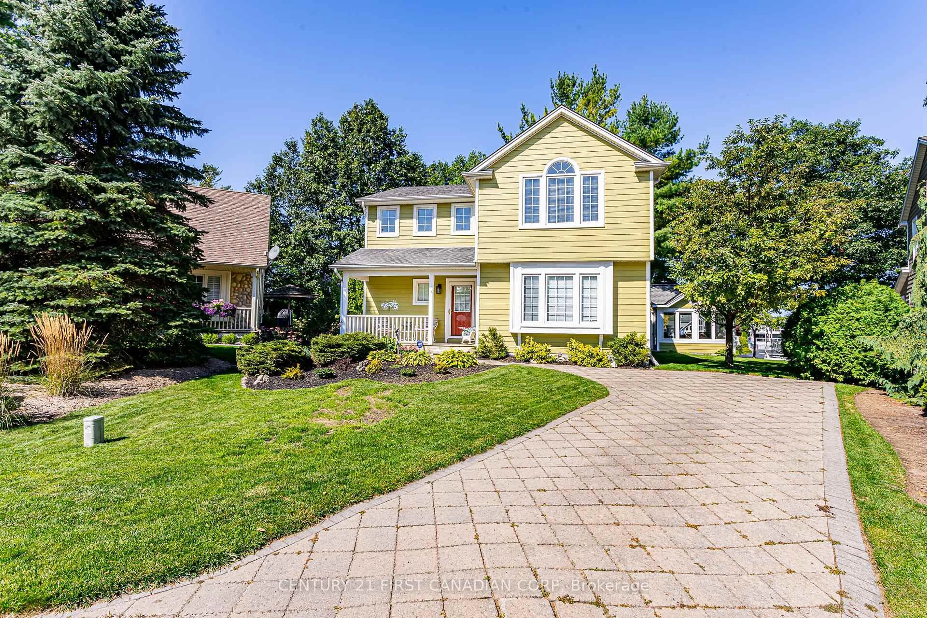 Home with vinyl exterior material, street for 12 Harbour Park Crt, Lambton Shores Ontario M0M 1T0