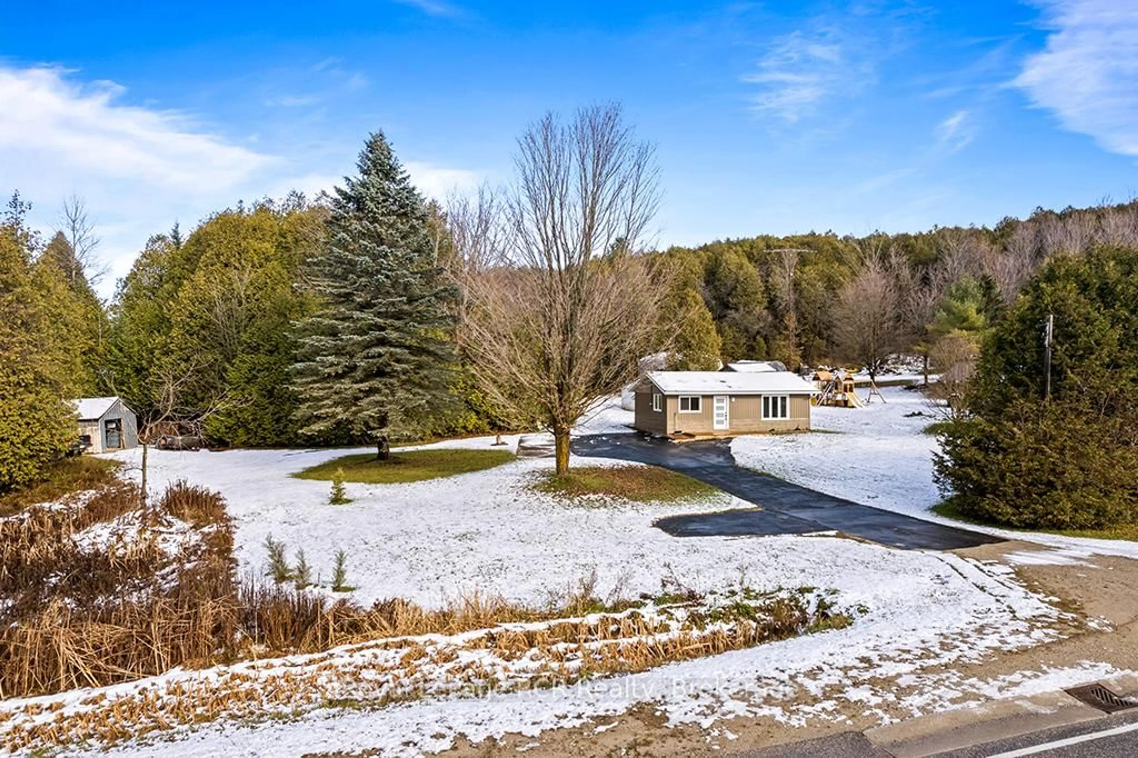 A pic from outside/outdoor area/front of a property/back of a property/a pic from drone, unknown for 405009 Grey 4 Rd, Grey Highlands Ontario N0C 1K0