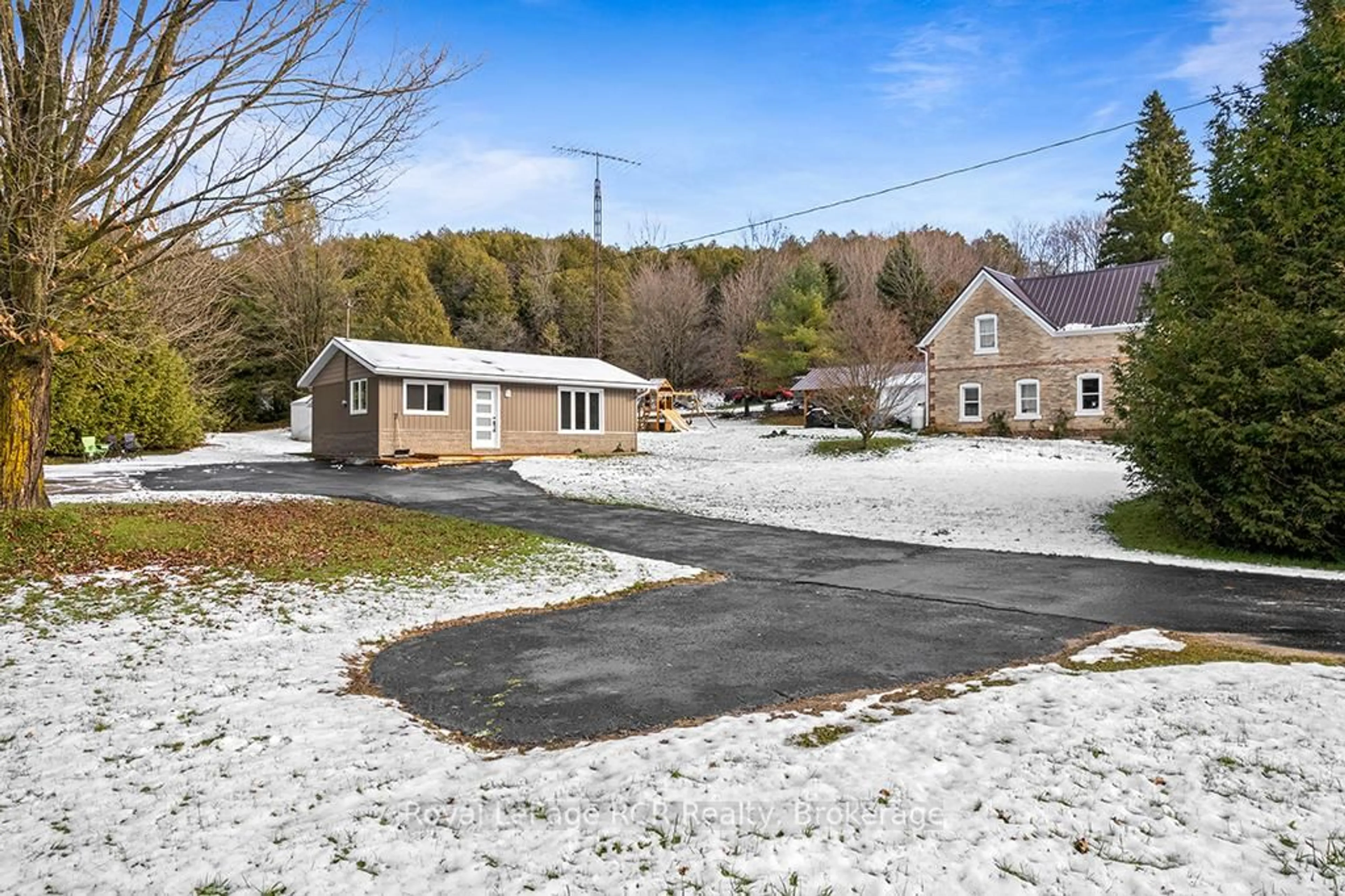 A pic from outside/outdoor area/front of a property/back of a property/a pic from drone, unknown for 405009 Grey 4 Rd, Grey Highlands Ontario N0C 1K0