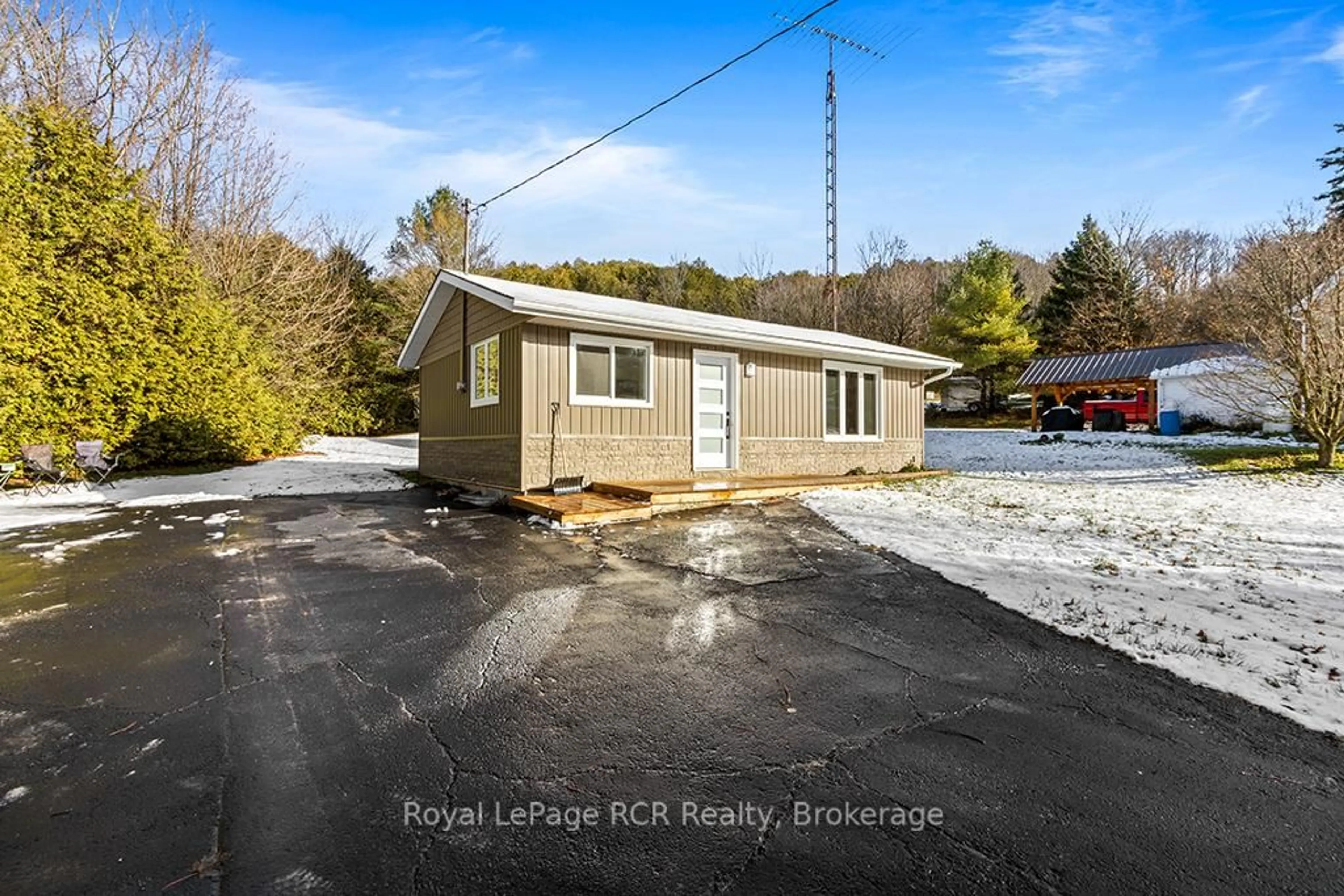 A pic from outside/outdoor area/front of a property/back of a property/a pic from drone, water/lake/river/ocean view for 405009 Grey 4 Rd, Grey Highlands Ontario N0C 1K0