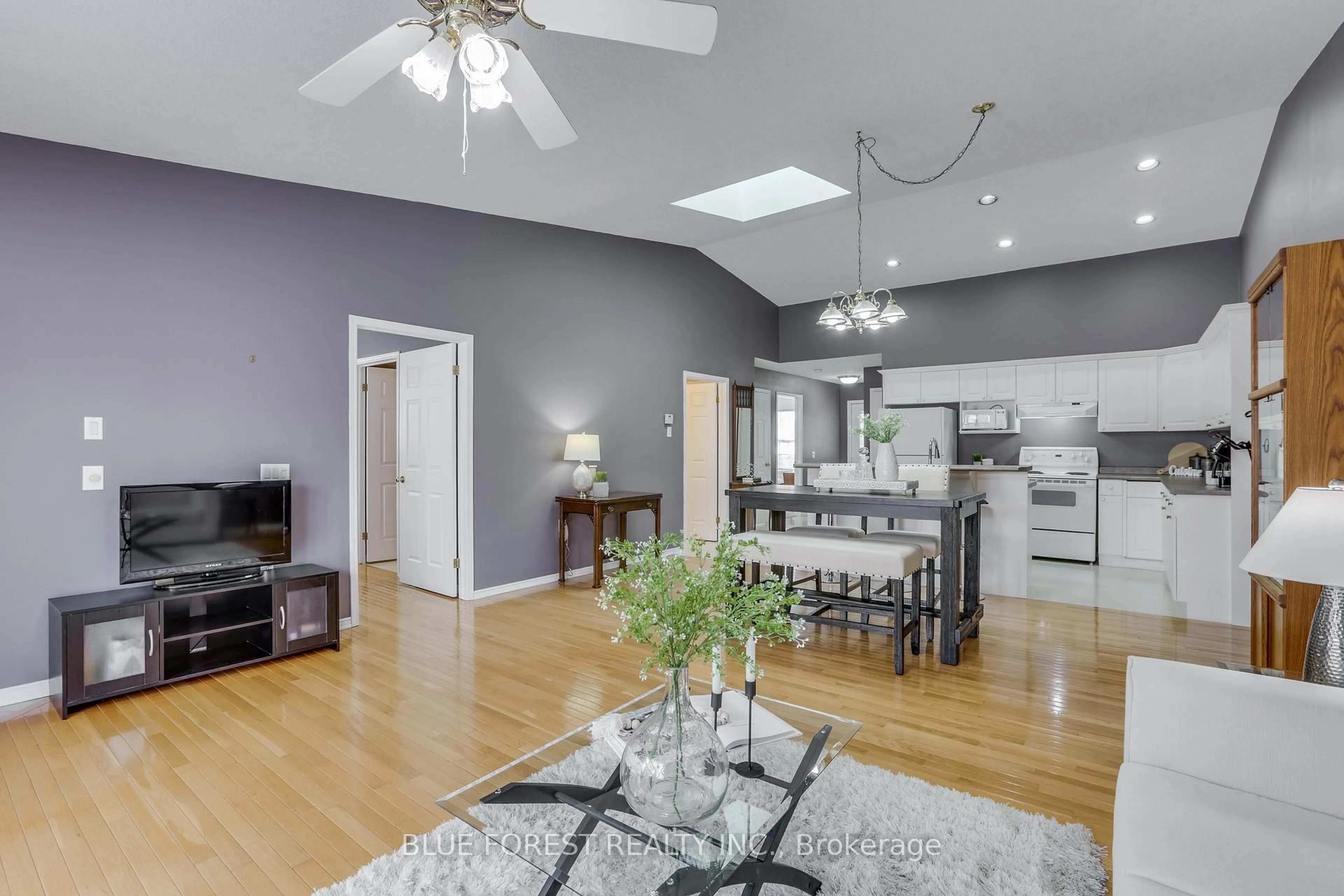 Open concept kitchen, wood/laminate floor for 680 Commissioners Rd #21, London South Ontario N6K 4T8