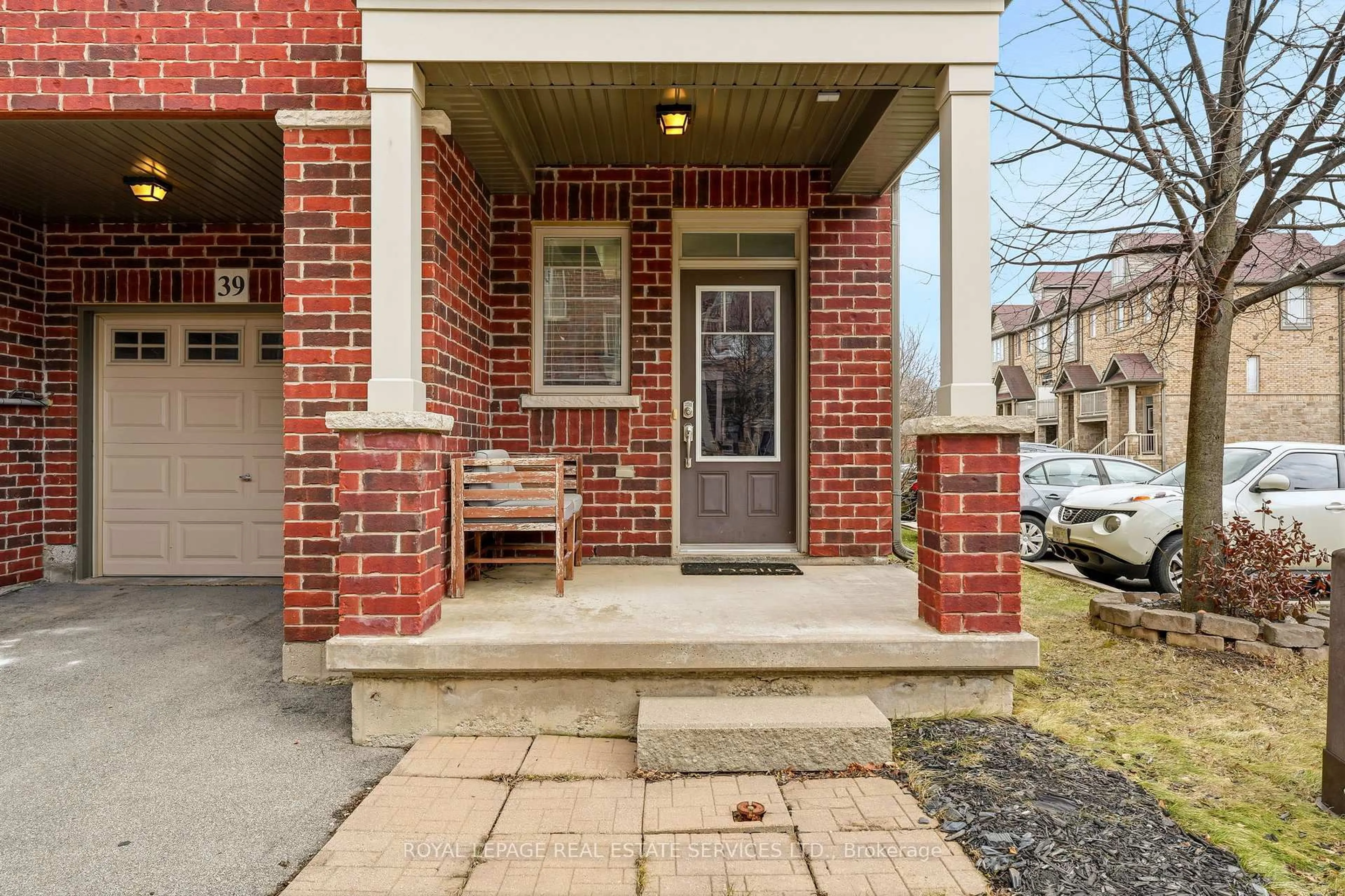 Home with brick exterior material, street for 310 Fall Fair Way #39, Hamilton Ontario L0R 1C0