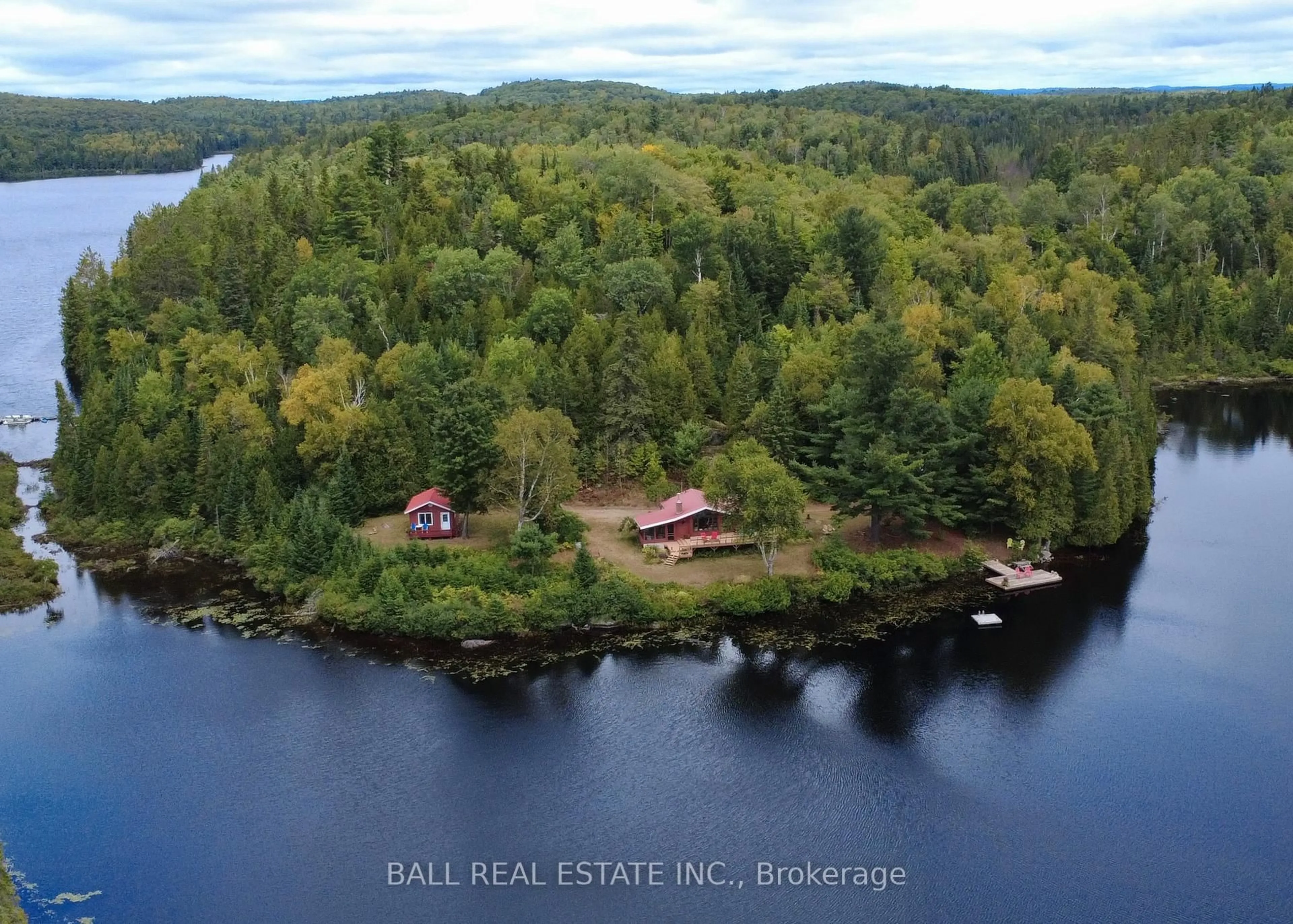 A pic from outside/outdoor area/front of a property/back of a property/a pic from drone, water/lake/river/ocean view for 198 Davies Lane, South Algonquin Ontario K0J 2C0