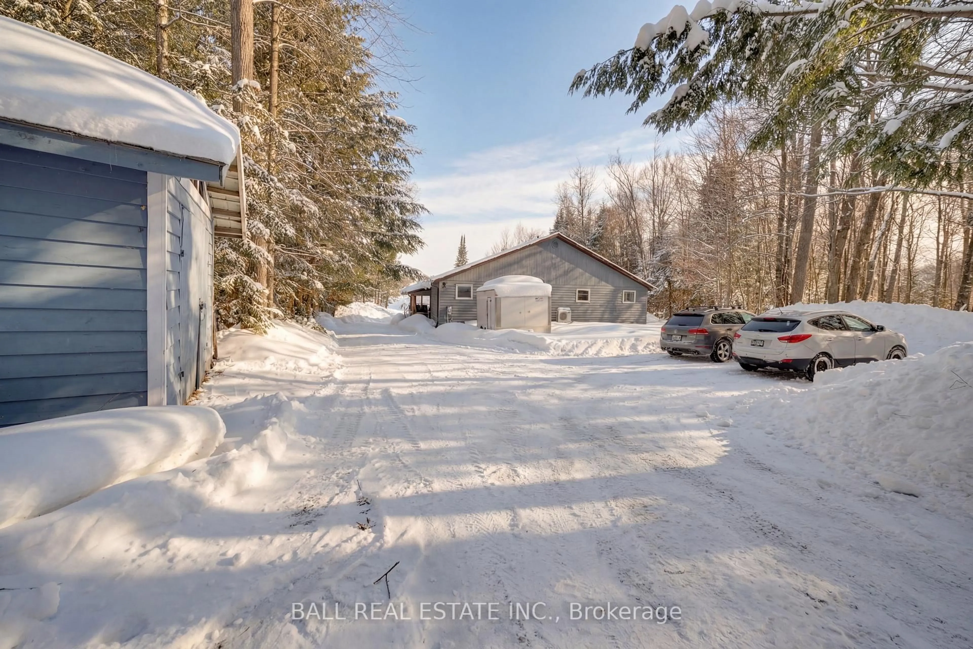 A pic from outside/outdoor area/front of a property/back of a property/a pic from drone, street for 1154 Surveyor Dr, Highlands East Ontario K0L 2Y0