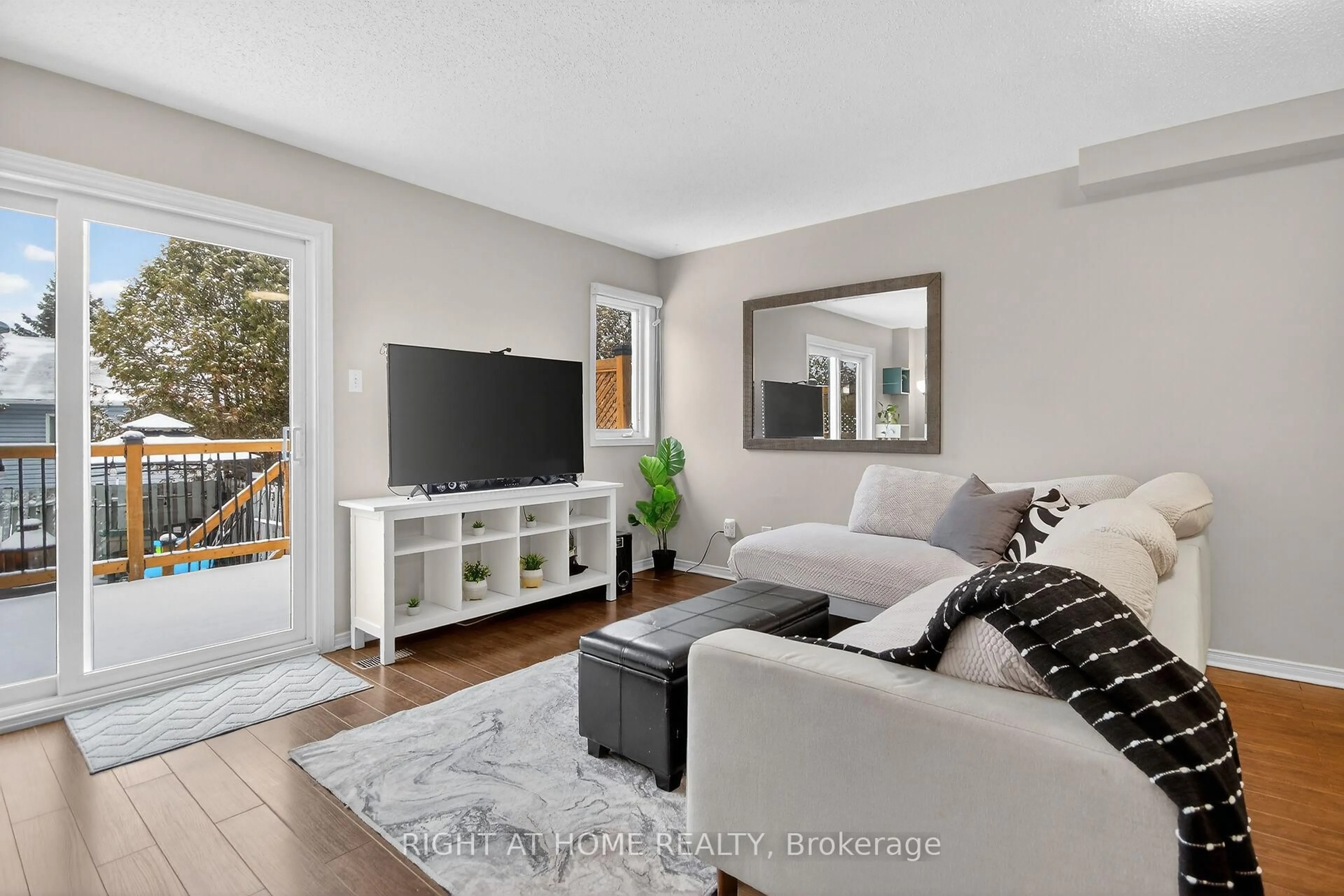 Living room with furniture, wood/laminate floor for 240 Mississippi Crt #18, Carleton Place Ontario K7C 4R1