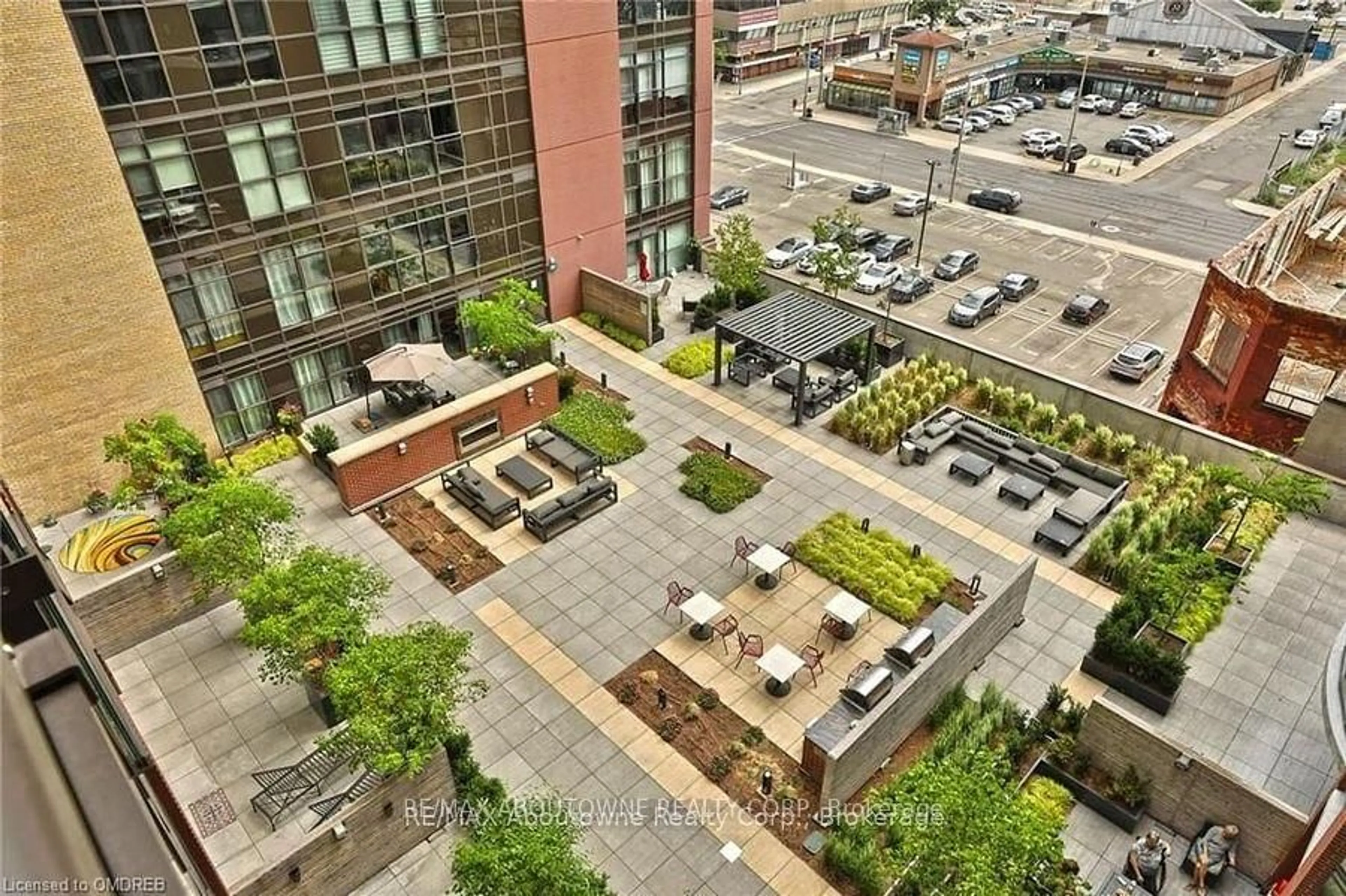 Patio, city buildings view from balcony for 118 King St #419, Hamilton Ontario L8N 0A9