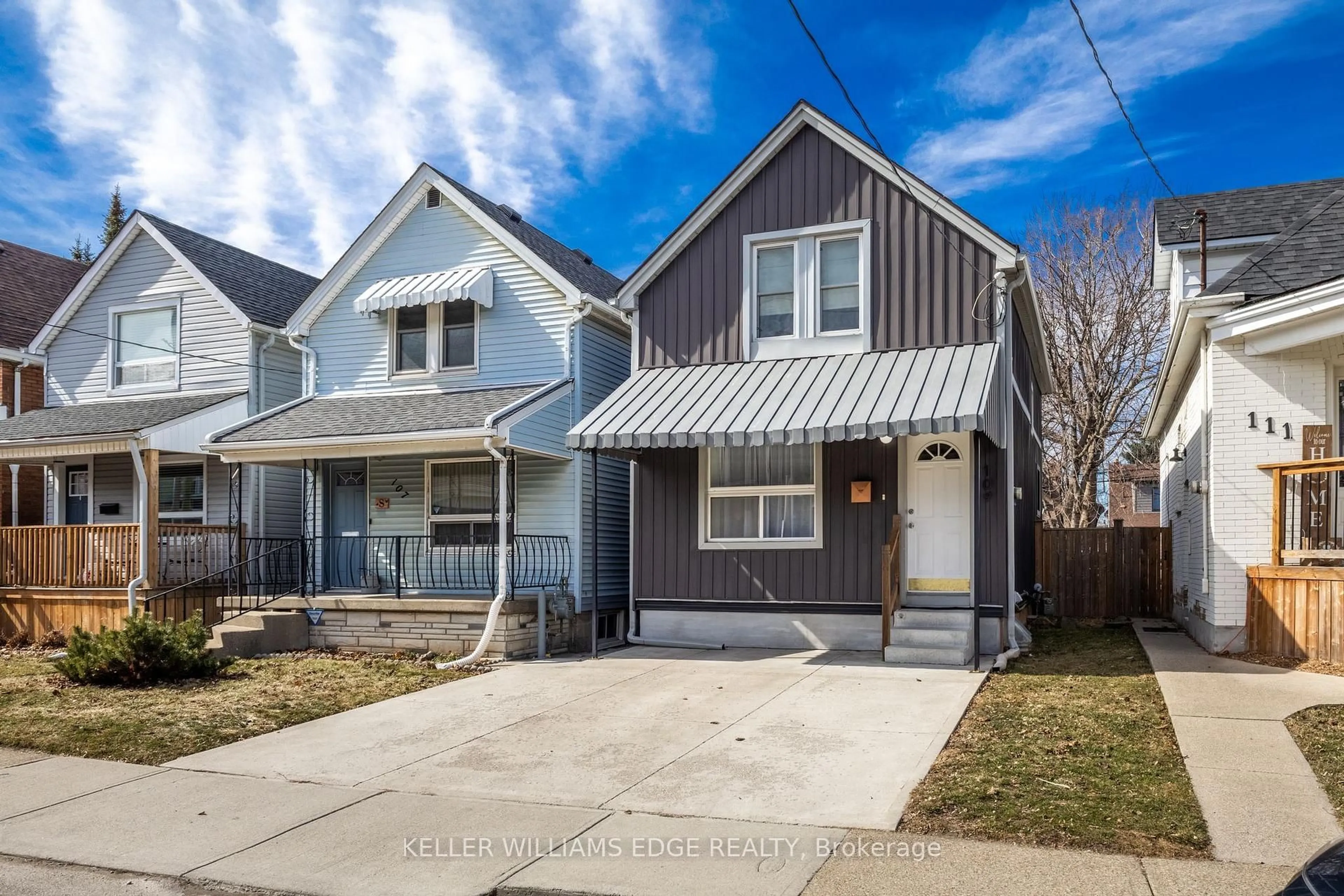 Home with vinyl exterior material, street for 109 Grosvenor Ave, Hamilton Ontario L8L 7S5