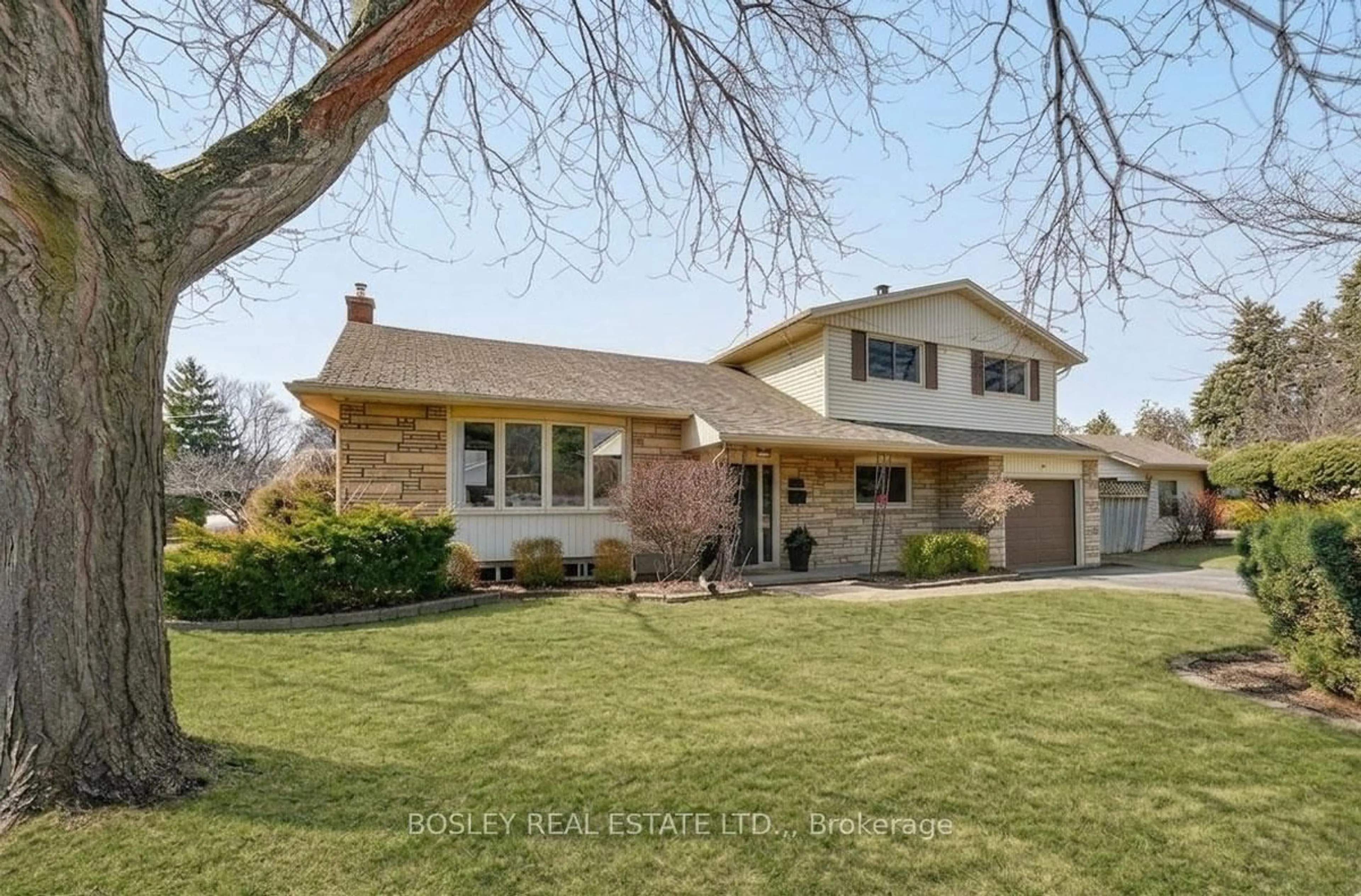 Home with brick exterior material, street for 1 Tanner Circ, St. Catharines Ontario L2N 3M8