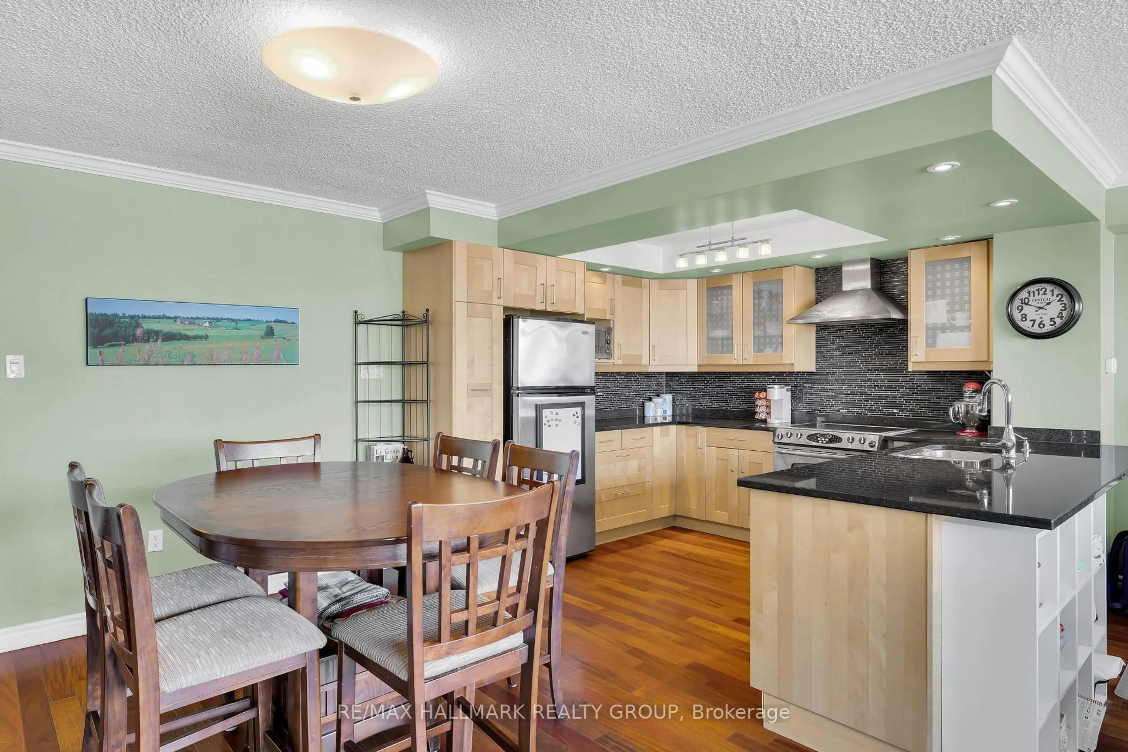 Open concept kitchen, wood/laminate floor for 500 Laurier Ave #2506, Ottawa Ontario K1R 5E1