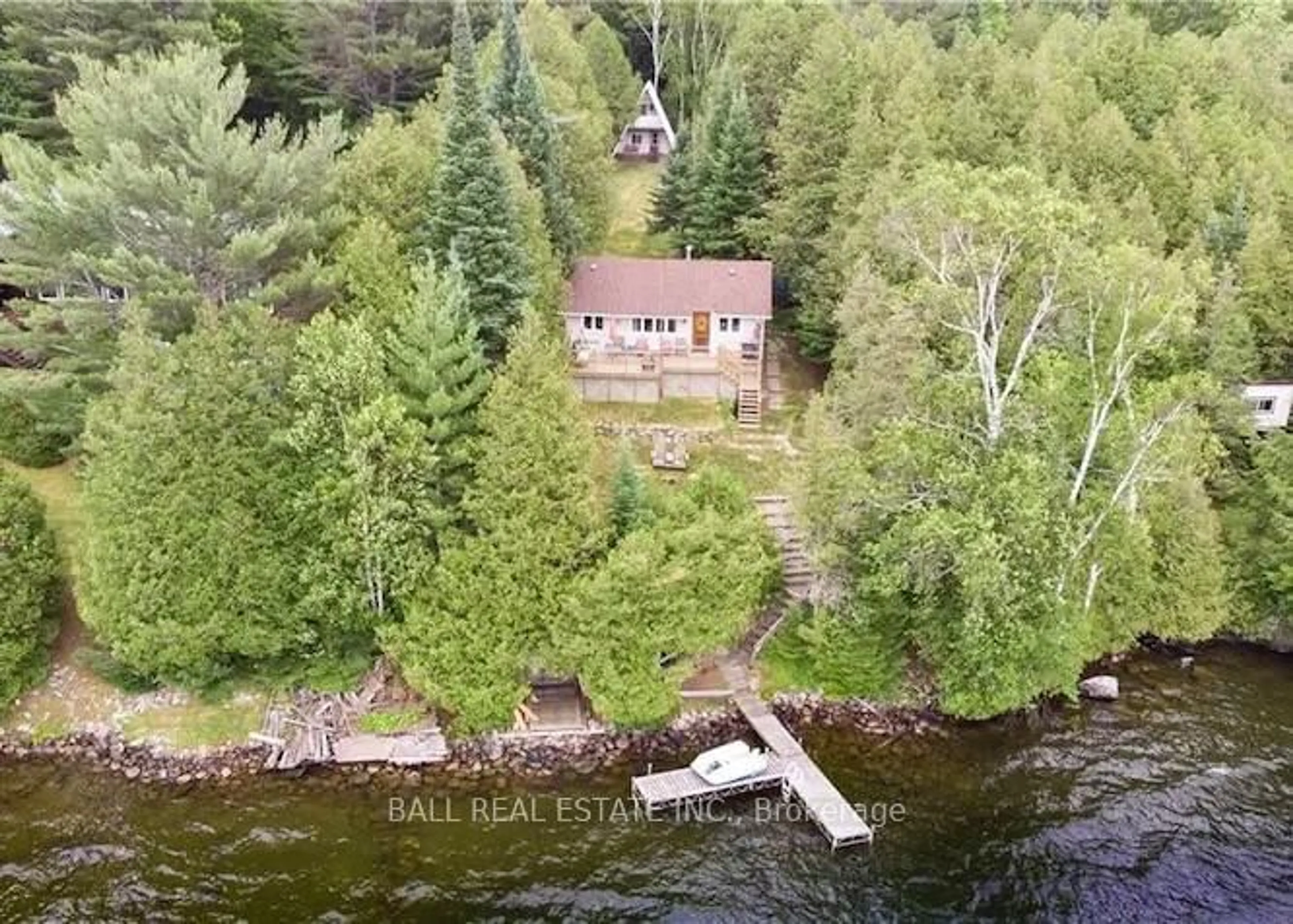 A pic from outside/outdoor area/front of a property/back of a property/a pic from drone, water/lake/river/ocean view for 170 Couchs Rd, North Kawartha Ontario K0L 1A0