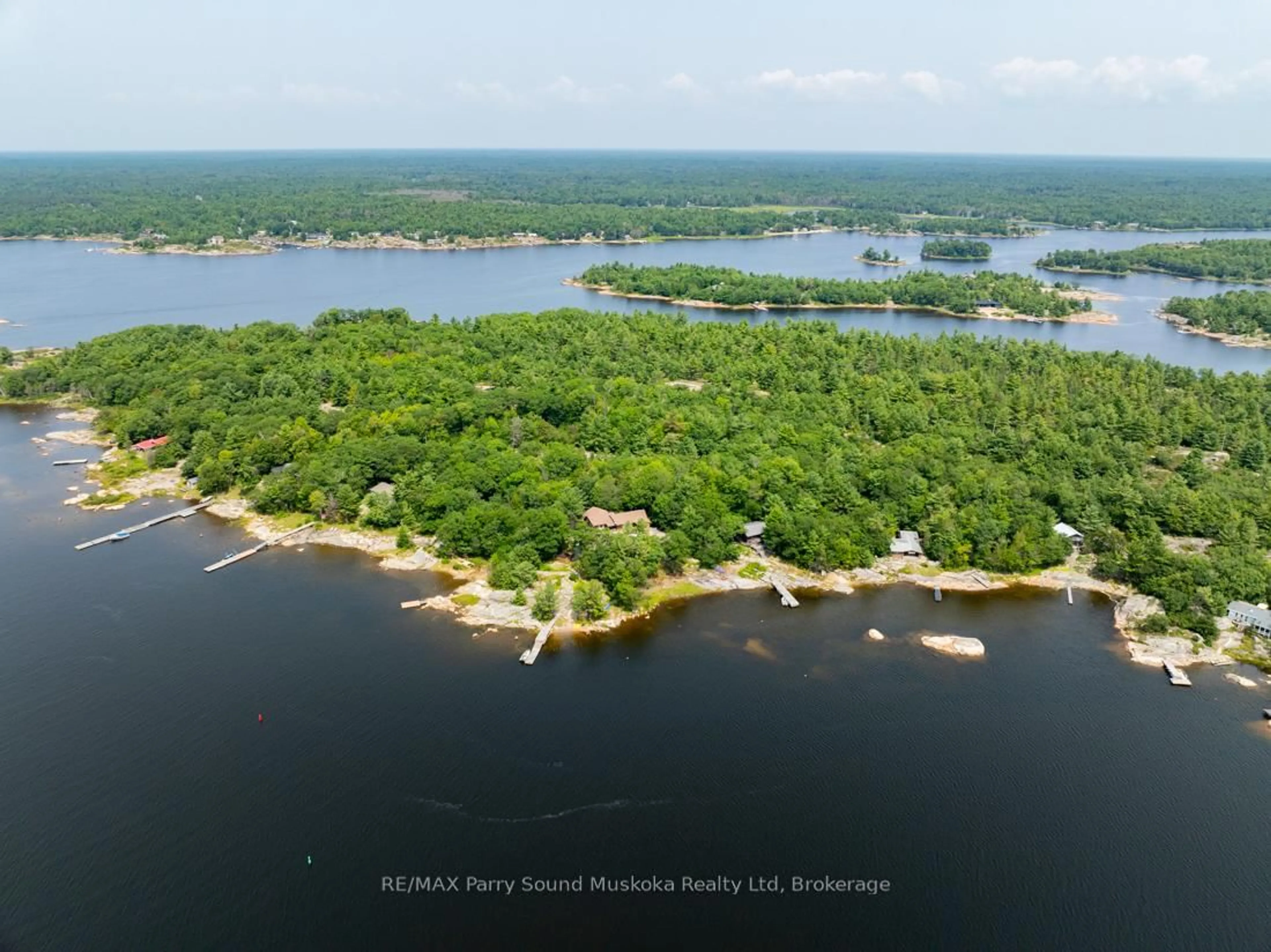 A pic from outside/outdoor area/front of a property/back of a property/a pic from drone, water/lake/river/ocean view for 16 Island 264c, Carling Ontario P0G 1G0